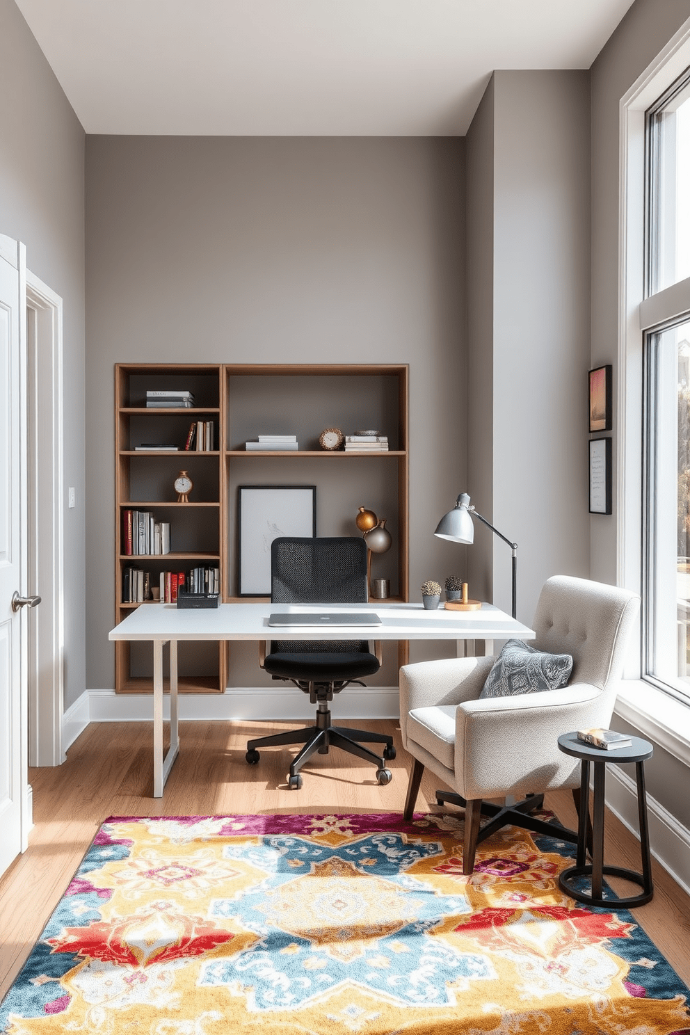 A stylish home office features a sleek desk positioned in front of a large window, allowing natural light to flood the space. The walls are painted in a soft gray, and a comfortable ergonomic chair complements the modern design. In one corner, a cozy reading nook is created with a plush armchair and a small bookshelf, providing a perfect spot for inspiration. The floor is adorned with a vibrant area rug that adds warmth and texture to the overall aesthetic.