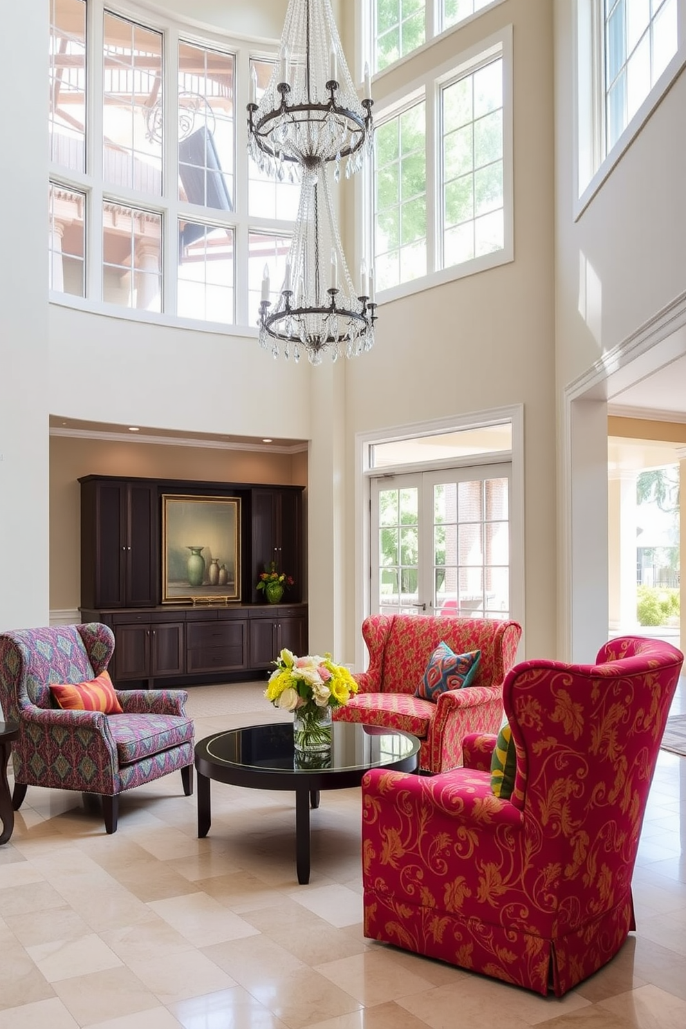 Colorful accent chairs in a spacious foyer create a vibrant focal point. The chairs are upholstered in rich fabrics with bold patterns, inviting guests to sit and enjoy the surroundings. The foyer features high ceilings and large windows that allow natural light to flood the space. A statement chandelier hangs above, complementing the colorful chairs and enhancing the overall elegance of the design.