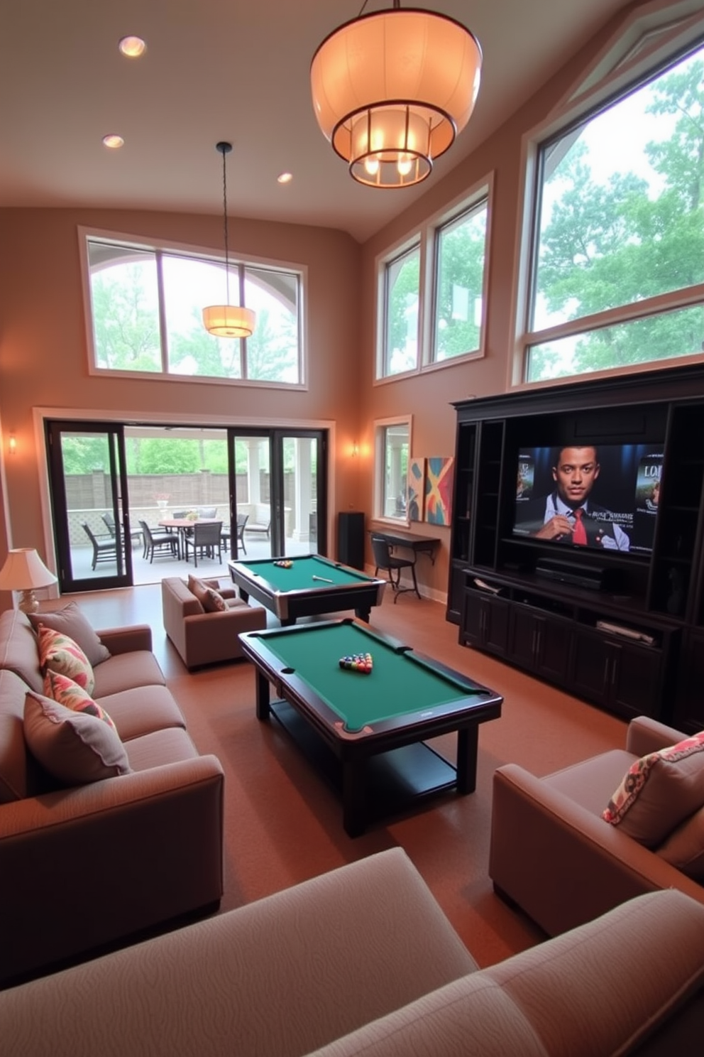 A spacious game room with large windows that open to an outdoor patio, allowing fresh air to flow in during breaks. The room features a mix of comfortable seating, a pool table, and a large entertainment center for gaming and movie nights. The walls are painted in a warm neutral tone, complemented by vibrant artwork that adds personality. Soft lighting fixtures create a cozy atmosphere, while easy access to the outdoors enhances the overall experience.