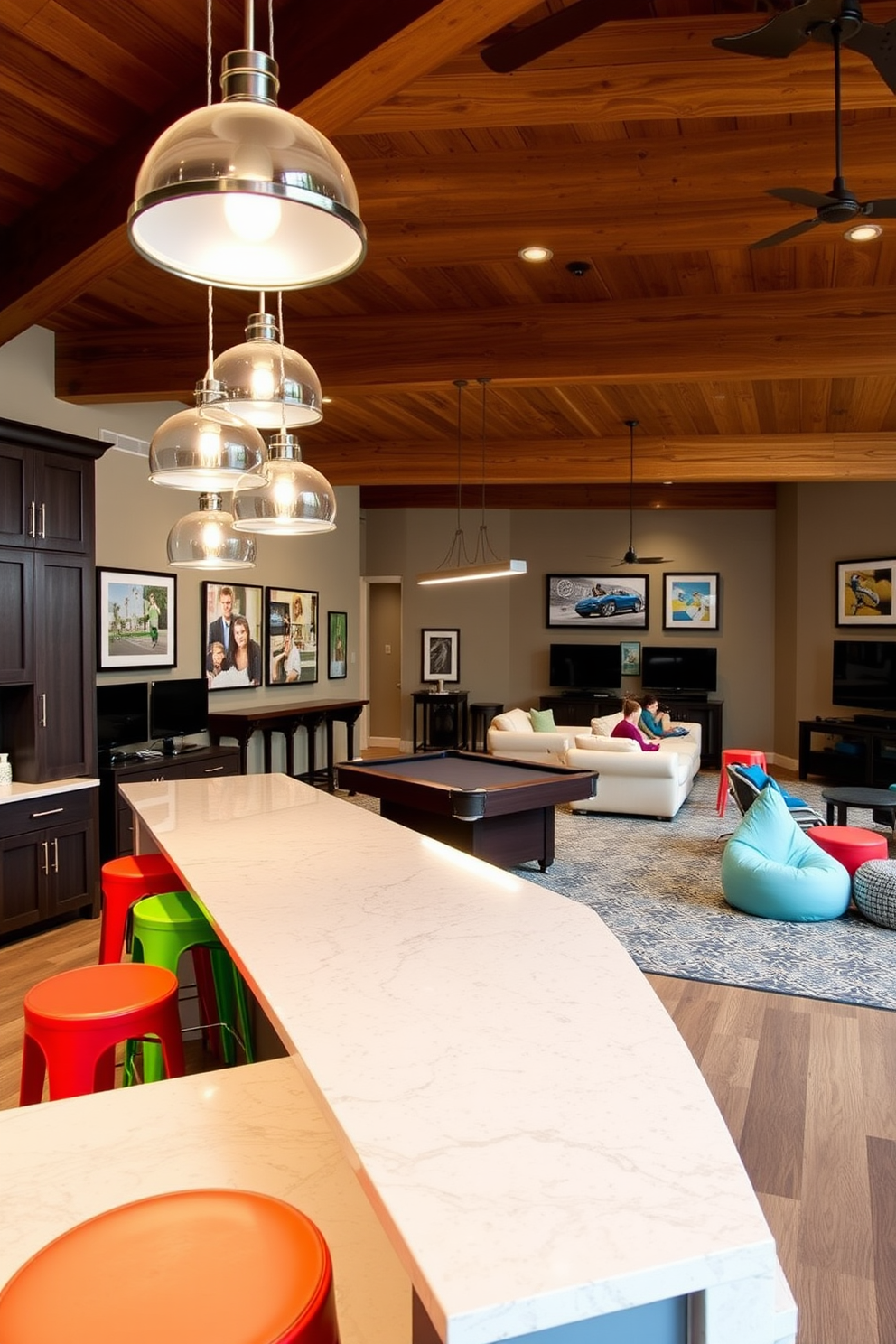 A stylish snack bar features a sleek countertop made of polished quartz, complemented by high-backed stools in vibrant colors. The bar is illuminated by pendant lights hanging from a wooden beam ceiling, creating a warm and inviting atmosphere. The large game room showcases a mix of comfortable seating arrangements, including a sectional sofa and bean bags for a relaxed vibe. A pool table occupies the center, surrounded by wall-mounted gaming consoles and framed artwork that reflects a playful spirit.