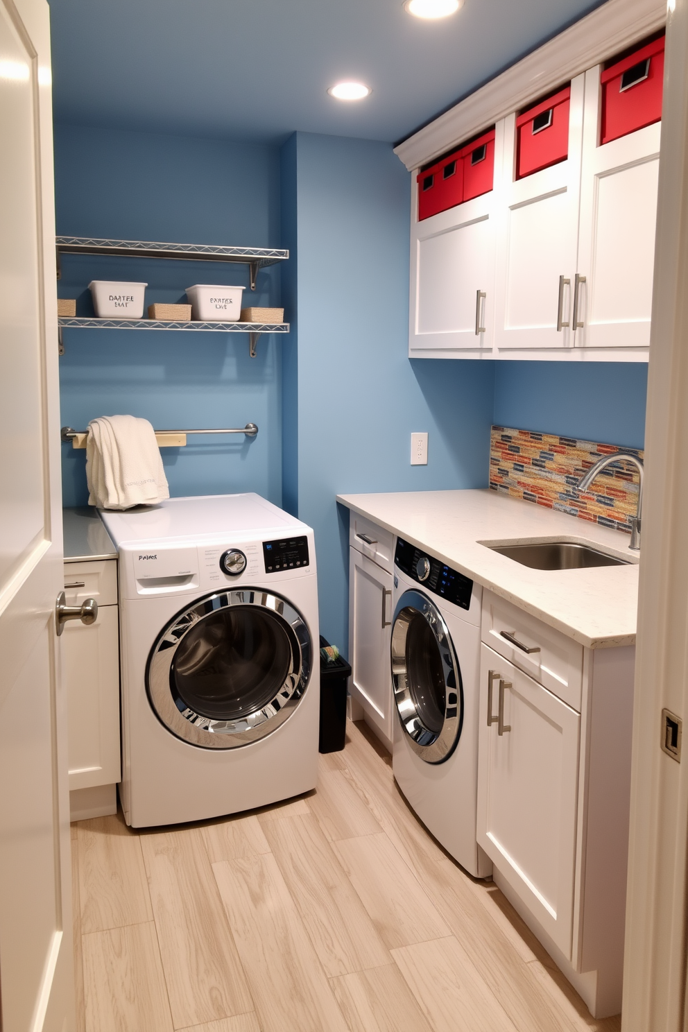 A functional laundry room in the basement designed with a color-coded system for organization. The walls are painted a soft blue, and the cabinetry features a bright white finish with labeled bins in various colors for sorting laundry. A large countertop made of durable quartz provides ample space for folding clothes, while a stylish backsplash in vibrant tiles adds a pop of color. The floor is equipped with easy-to-clean vinyl planks in a light gray shade, complementing the overall design.