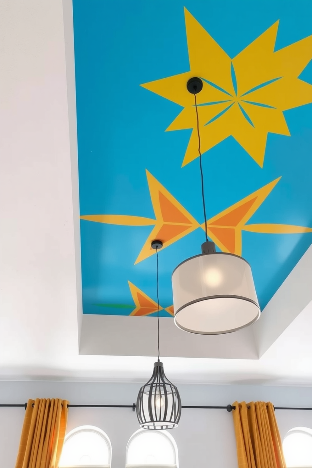 Brightly colored ceiling to energize space. The ceiling features a vibrant blue hue that contrasts beautifully with the soft white walls. Bold geometric patterns are painted in bright yellow and orange, creating a dynamic visual interest. Large pendant lights with a modern design hang from the ceiling, adding both style and illumination to the room.