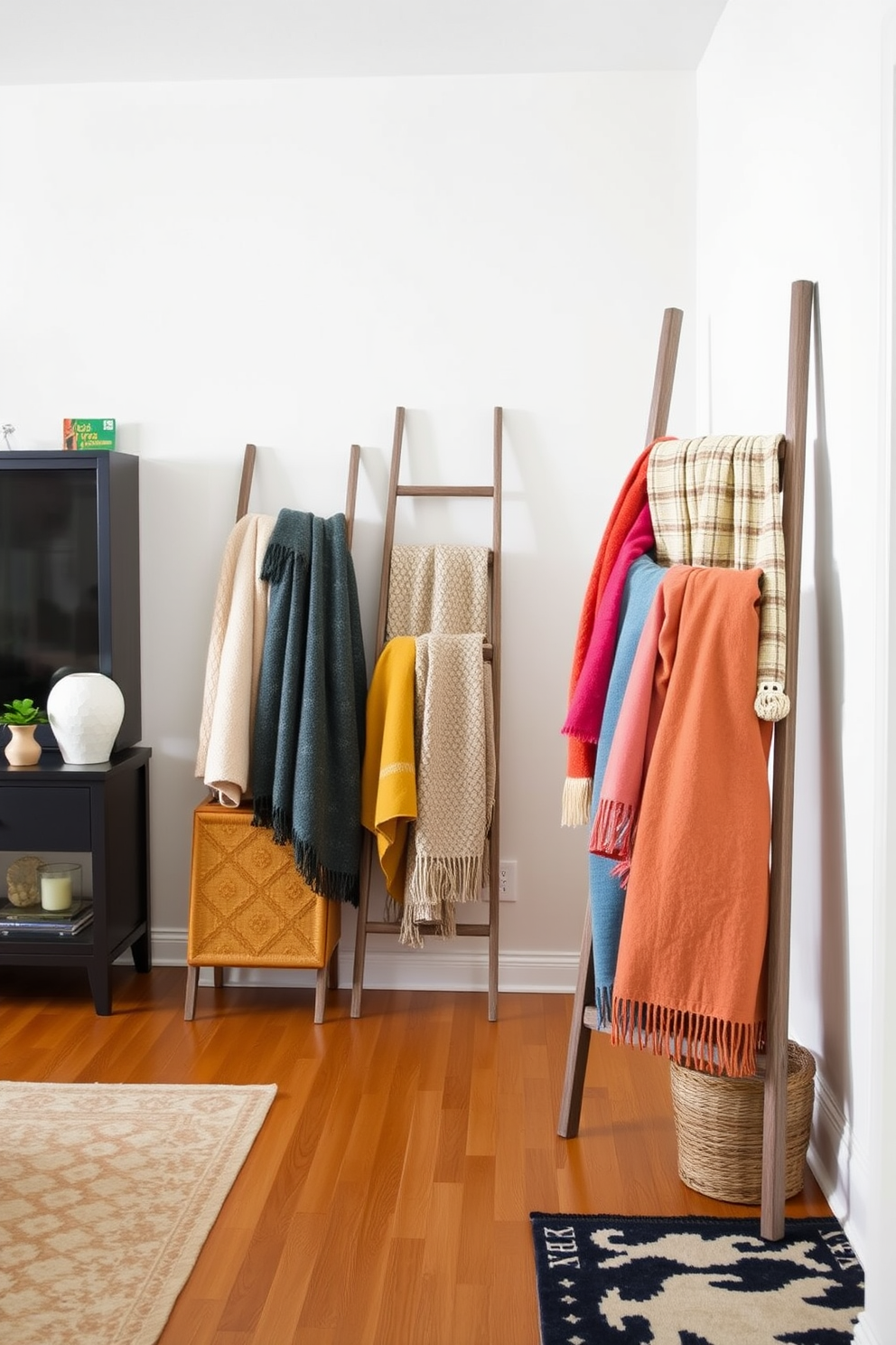 A decorative ladder is placed against a light-colored wall in the living room, showcasing a collection of cozy blankets in various textures and colors. The ladder adds both functionality and a touch of charm, inviting warmth and comfort to the space. In the entryway, a stylish console table is paired with a decorative ladder that holds an assortment of vibrant throws. The combination of elements creates an inviting atmosphere, perfect for welcoming guests into the home.