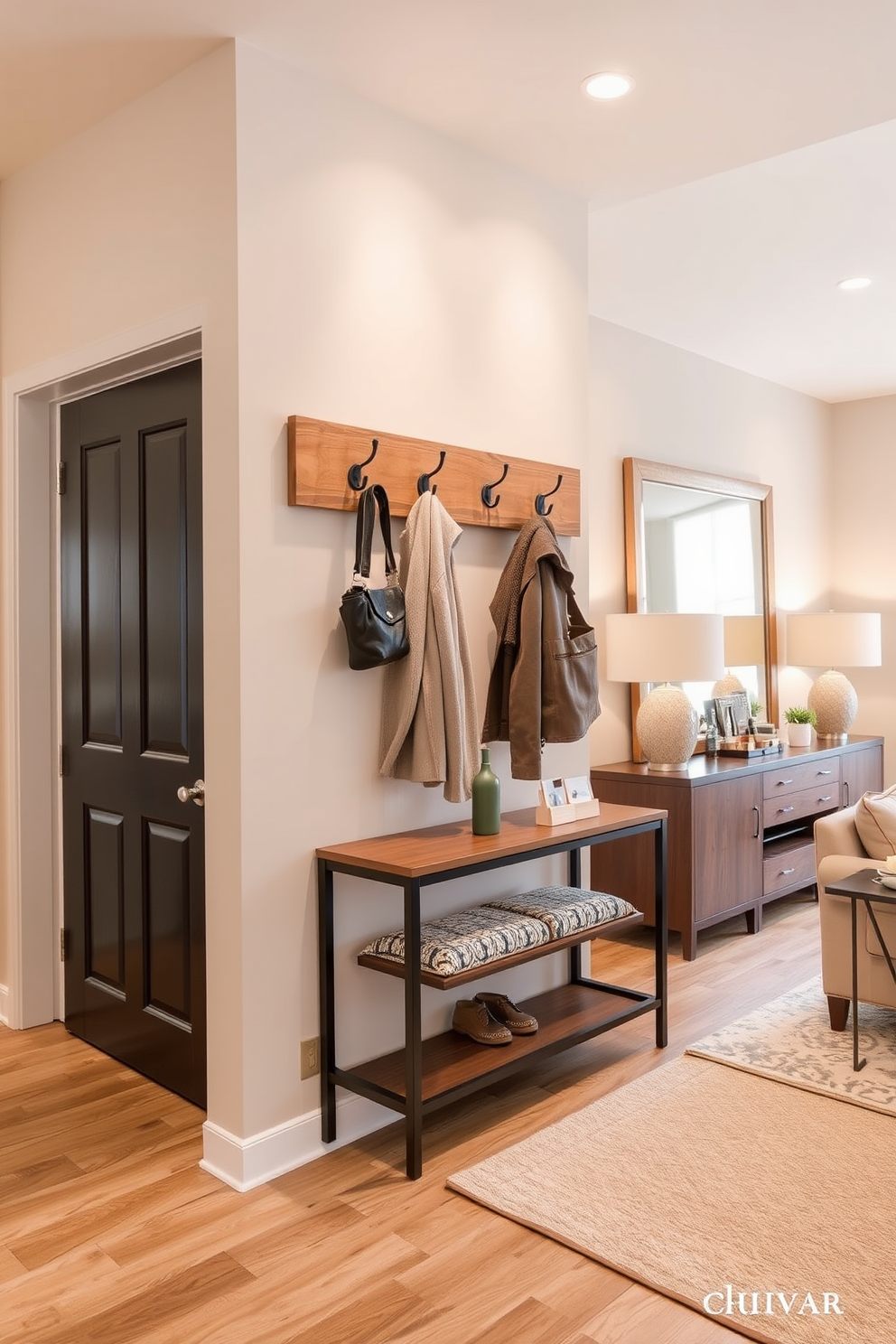 Functional coat hooks for organization. The entryway features a stylish wall-mounted coat rack made of natural wood, complemented by sleek metal hooks. Warm lighting illuminates the space, creating an inviting atmosphere. A decorative bench sits below the coat hooks, providing a convenient spot for putting on or taking off shoes. Living Room Entryway Design Ideas. The entryway flows seamlessly into the living room, showcasing a cohesive color palette of soft neutrals and earthy tones. A statement console table adorned with decorative items and a large mirror enhances the sense of space and style.