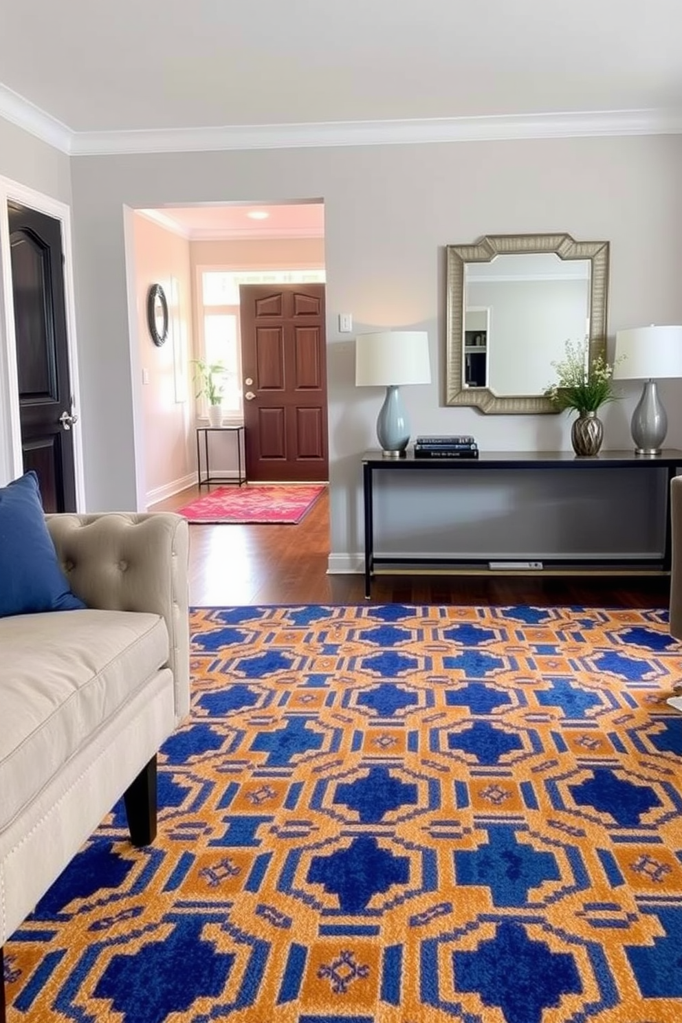 A stylish area rug anchors the living room, featuring a bold geometric pattern in shades of blue and gold. It complements the surrounding furniture, creating a warm and inviting atmosphere. In the entryway, a sleek console table is paired with a chic mirror above it. The space is enhanced by a vibrant area rug that adds texture and color, making a striking first impression.