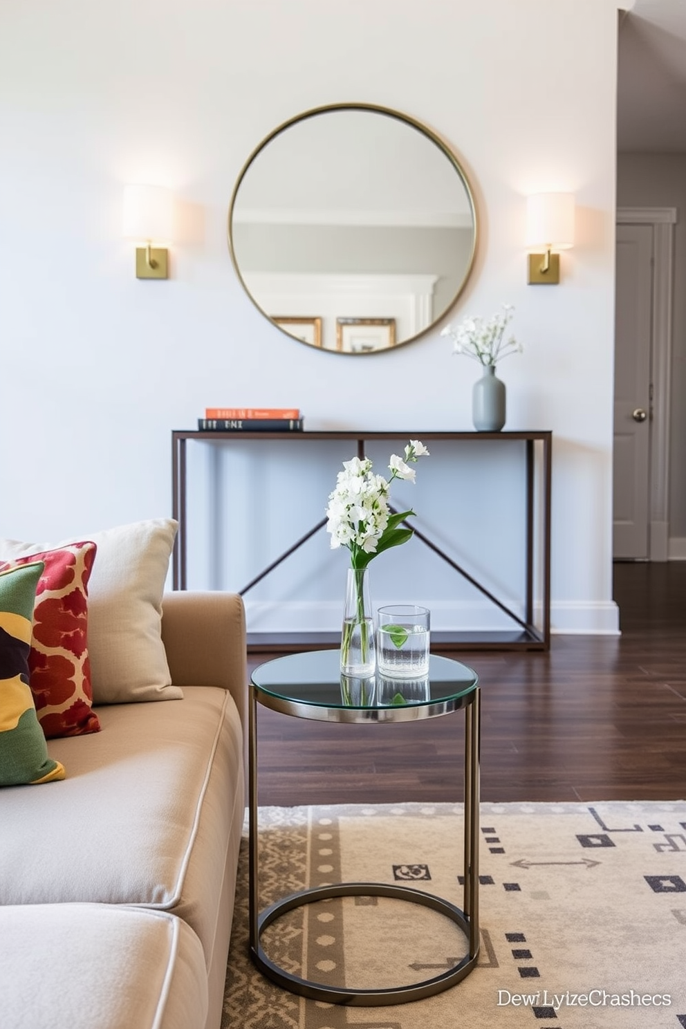 A compact side table for drinks in a modern living room. The table is made of sleek glass with a minimalist metal frame, positioned beside a plush sofa adorned with colorful cushions. An inviting entryway design featuring a stylish console table. The table is paired with a large round mirror above it, flanked by decorative wall sconces that cast a warm glow.