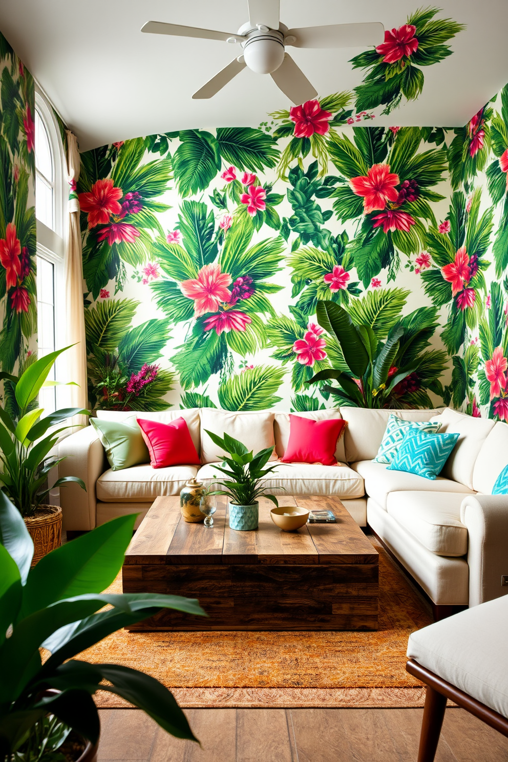 A vibrant living room adorned with tropical motifs that seamlessly blend the indoors with the outdoors. The walls are covered in a lush green wallpaper featuring large palm leaves and colorful flowers, creating a refreshing and inviting atmosphere. The furniture includes a plush sectional sofa in a light beige fabric, accented with bright throw pillows that echo the colors in the wallpaper. A large coffee table made of reclaimed wood sits in the center, surrounded by a few potted plants that enhance the tropical feel.