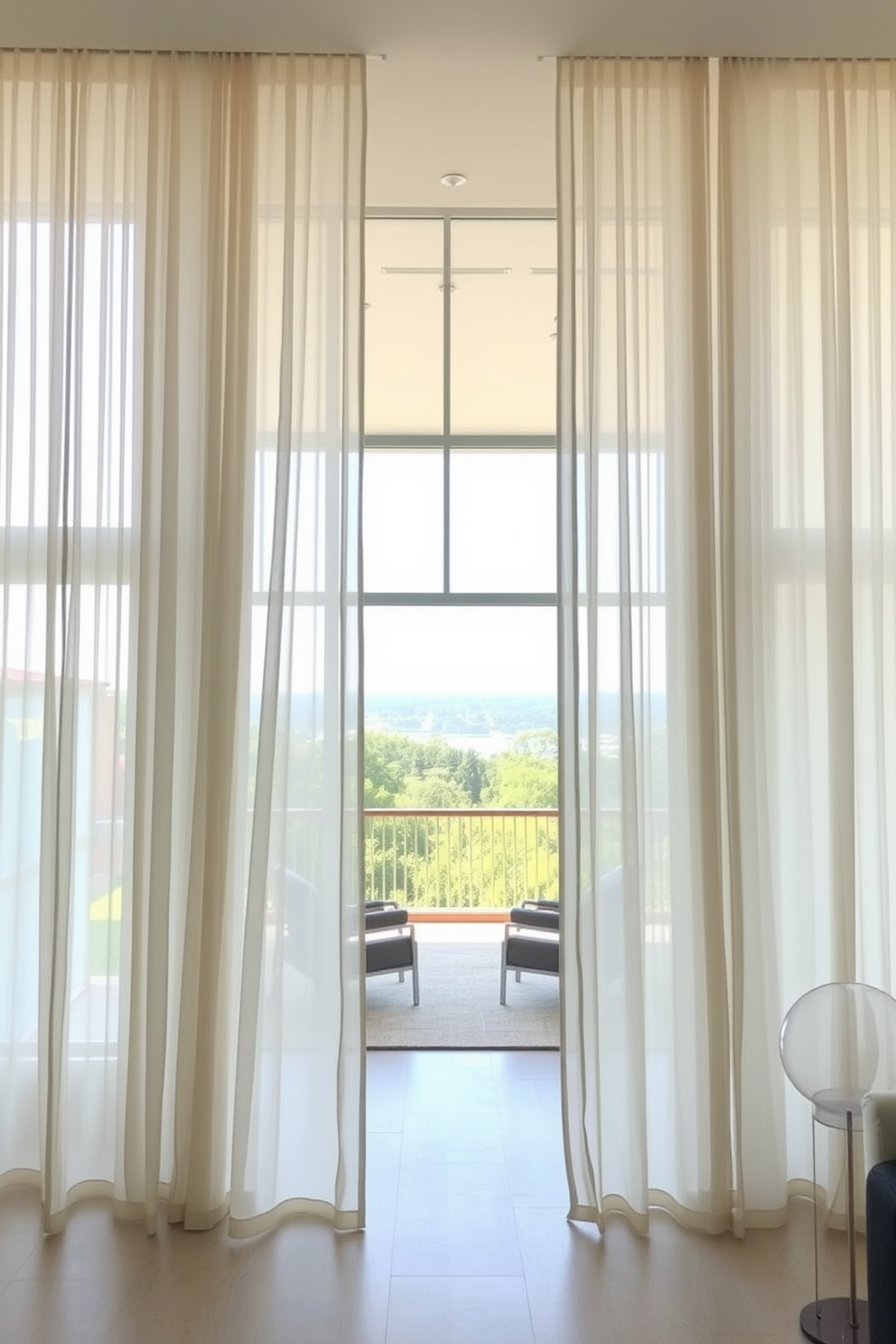 A spacious living room featuring floor to ceiling sheer curtains that allow soft natural light to filter in. The curtains are in a light ivory color, creating an airy and elegant atmosphere while framing a stunning view outside.