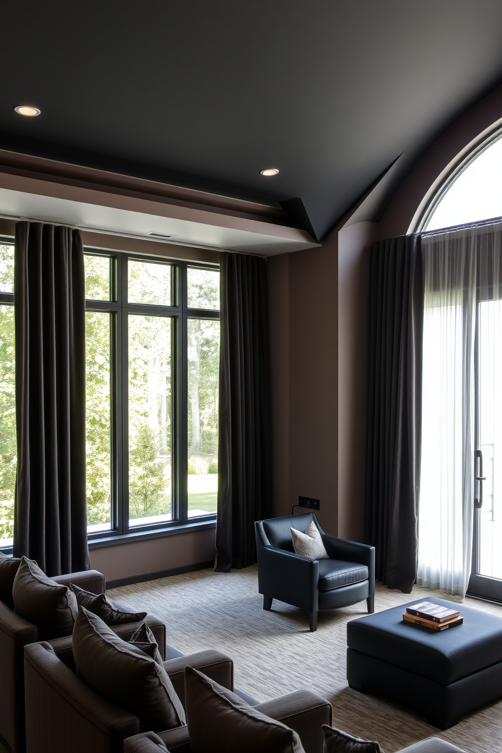 A media room designed with blackout curtains to enhance functionality and create an immersive viewing experience. The curtains are made of thick, luxurious fabric in a deep charcoal color, elegantly framing the large windows while effectively blocking out light. For the living room, consider window design ideas that blend style and practicality. Large, floor-to-ceiling windows allow natural light to flood the space, complemented by sheer drapes that soften the sunlight and add a touch of elegance.