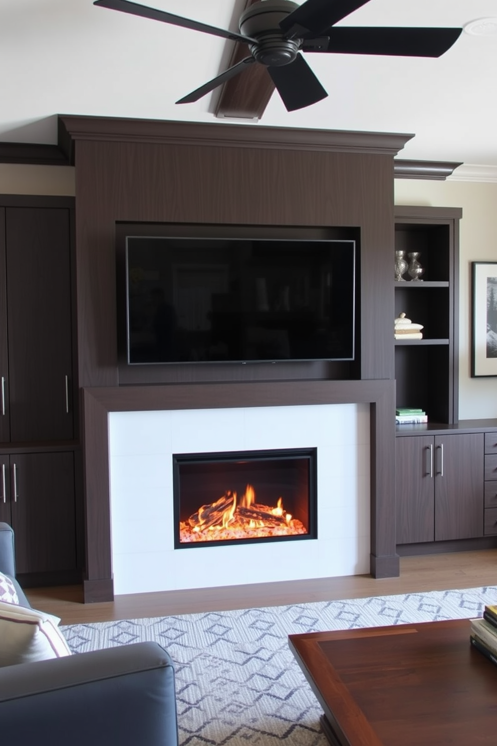 A cozy living room featuring a modern fireplace integrated into a sleek built-in media center. The media center is framed with custom cabinetry, housing a large flat-screen TV above the fireplace, creating a stylish focal point in the room.