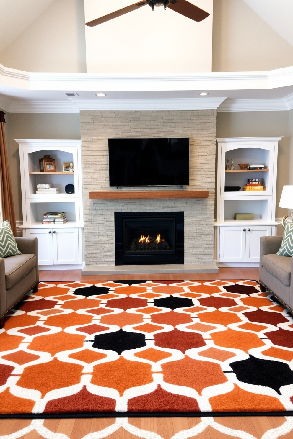 A stylish area rug anchors the living room, featuring a bold geometric pattern in warm tones that complements the surrounding decor. The space is enhanced by a modern fireplace, framed by built-in shelves, and a sleek television mounted above, creating a cozy yet functional entertainment area.