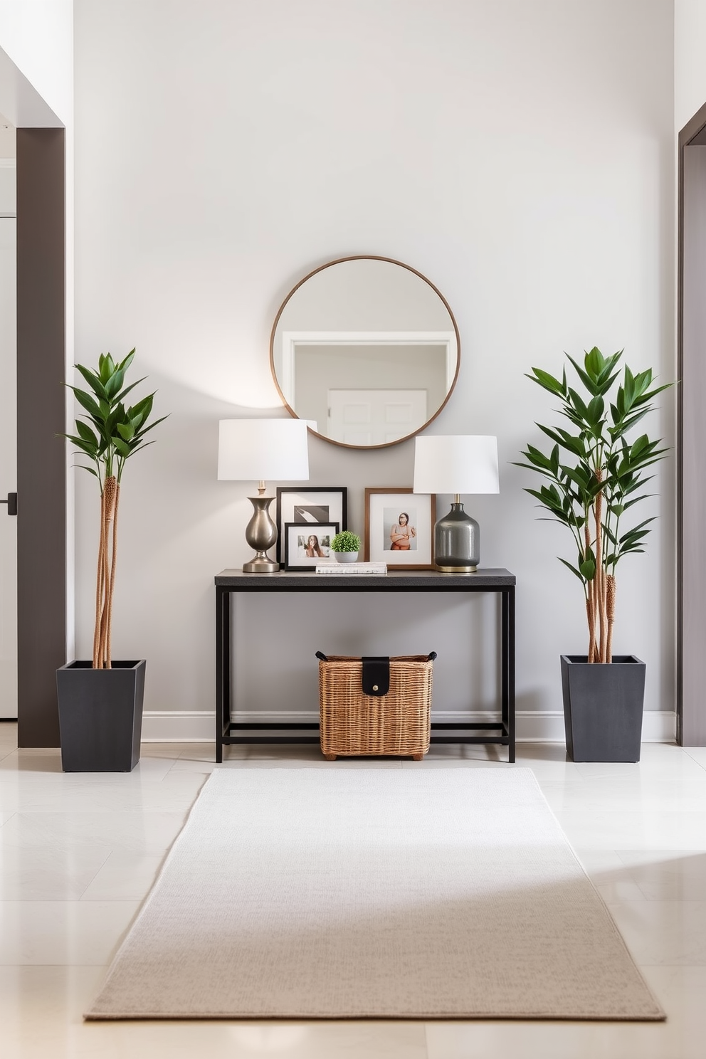 A chic console table is positioned against a soft gray wall, adorned with decorative accents like a stylish lamp and a cluster of framed photographs. Below the table, a woven basket adds texture and functionality while a small potted plant brings a touch of greenery. The foyer features a long, elegant design with a sleek runner rug that guides guests into the space. Flanking the entrance, tall plants in modern planters create a welcoming atmosphere, complemented by a statement mirror that reflects light and enhances the sense of openness.