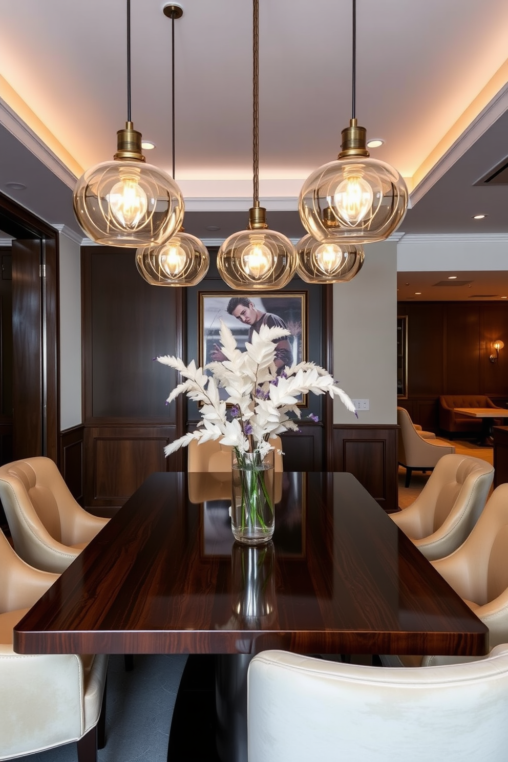 A chic dining area features elegant pendant lights suspended gracefully above a polished wooden table. The room is adorned with plush upholstered chairs and a striking centerpiece that enhances the luxurious atmosphere.