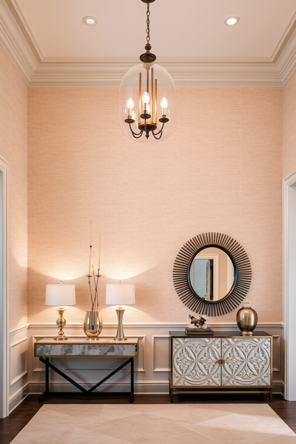 A luxury foyer featuring textured wall treatments that add depth and sophistication. The walls are adorned with a combination of wainscoting and a soft fabric paneling in neutral tones. Elegant lighting fixtures hang from the ceiling, casting a warm glow over the space. A stylish console table is placed against the wall, complemented by a statement mirror and decorative accessories.