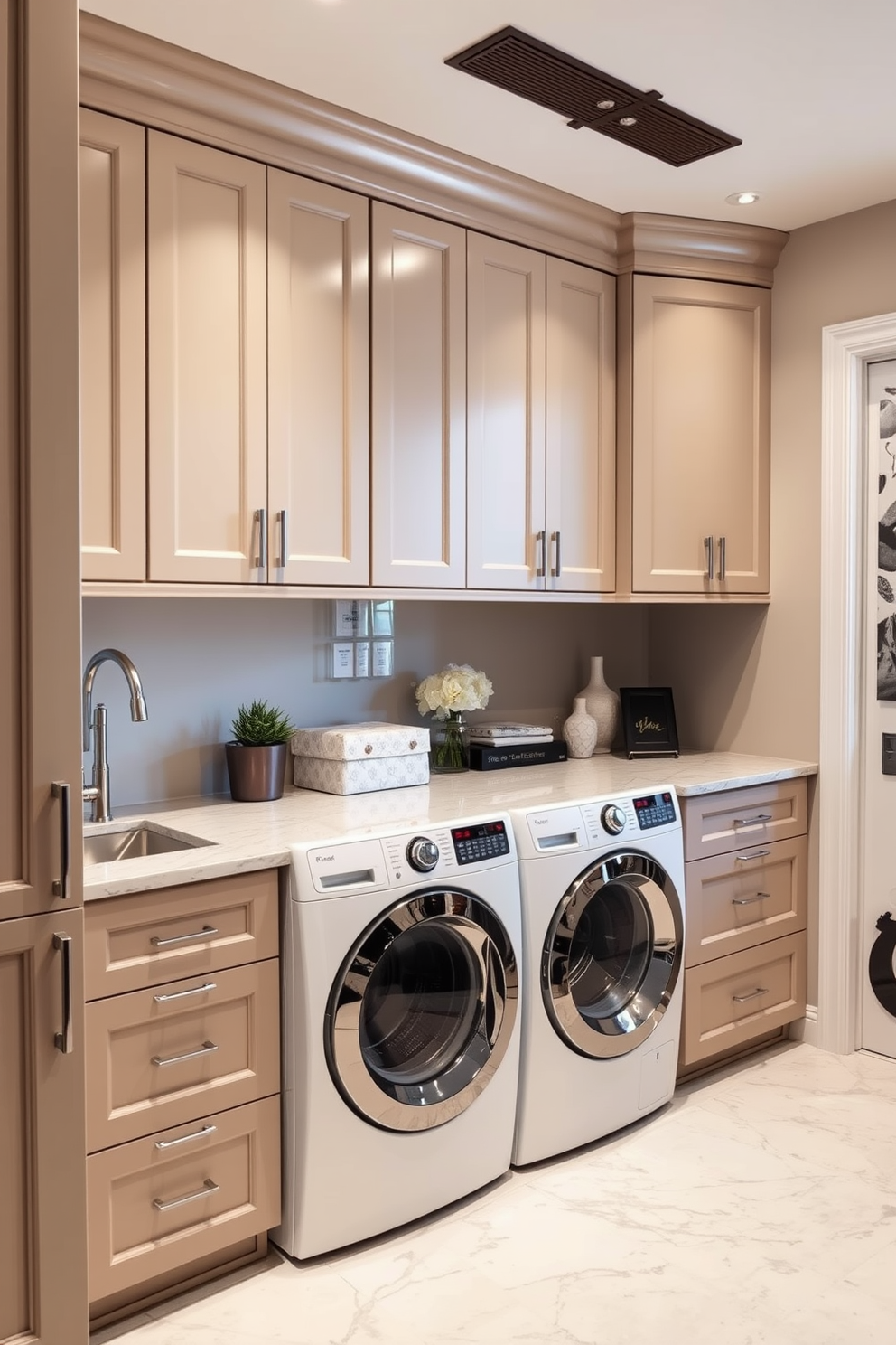 A luxury laundry room featuring custom cabinetry with a sleek finish and ample storage space. The room is adorned with stylish artwork on the walls and decorative accents that reflect personal taste. The countertops are made of durable quartz, providing a chic surface for folding clothes. A modern washer and dryer are seamlessly integrated into the design, complemented by elegant lighting fixtures that enhance the overall ambiance.