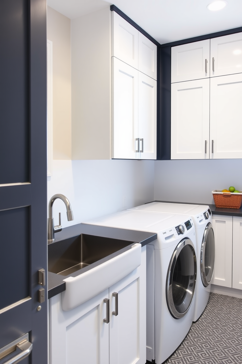 A stylish laundry room featuring a spacious laundry sink equipped with a designer faucet. The cabinetry is sleek and modern, with a combination of white and navy blue finishes, providing both functionality and elegance.