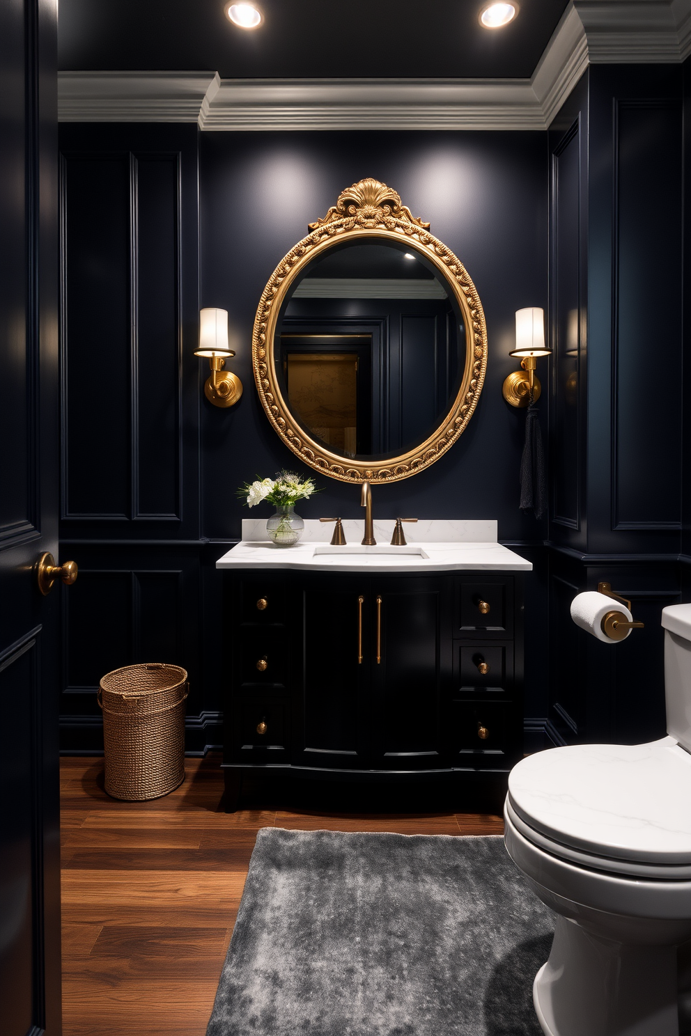 A luxury powder room featuring a dark moody color scheme that exudes drama. The walls are painted in deep navy blue with gold accents, and a sleek black vanity with a white marble countertop sits prominently. A large round mirror with an ornate gold frame reflects the ambient lighting from stylish sconces. The floor is covered in rich dark wood, complemented by a plush area rug in shades of grey and black.