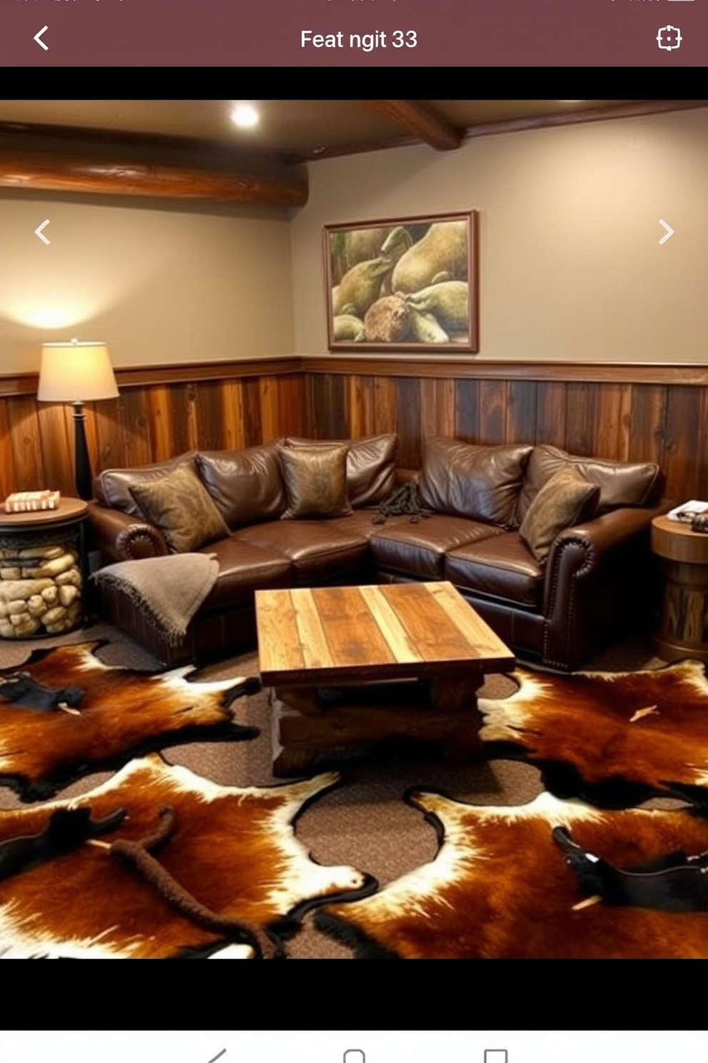 A cozy man cave featuring faux animal hides scattered across the floor to create a rugged and inviting atmosphere. The walls are adorned with dark wood paneling, and a large leather sectional sofa sits prominently in the center, complemented by a rustic coffee table made from reclaimed wood.