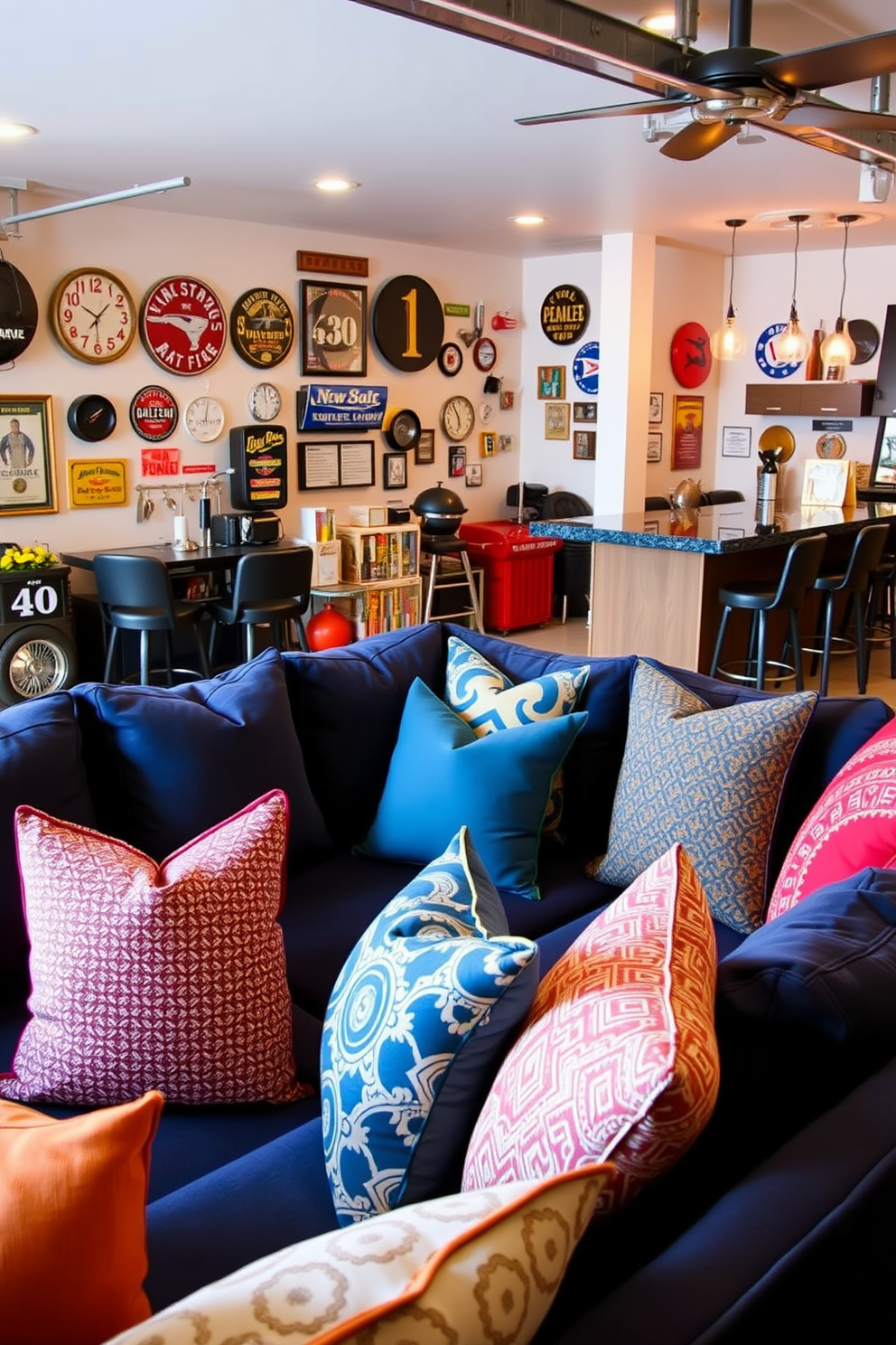 Comfortable seating with throw pillows. A plush sectional sofa in a rich navy blue fabric is adorned with an assortment of colorful throw pillows in various patterns and textures. Man Cave Garage Design Ideas. The garage features a sleek bar area with high-top stools, surrounded by vintage memorabilia and ambient lighting that creates a relaxed atmosphere.