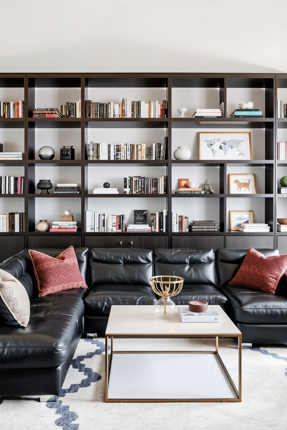 Sleek shelving units line the walls of a stylish living room, showcasing an array of books and curated decor pieces. The shelves are made of dark wood with clean lines, creating a modern yet warm atmosphere. A large leather sectional sofa anchors the space, paired with a minimalist coffee table in a contrasting light color. Accent pillows in rich textures add a touch of comfort, while a statement rug ties the room together.