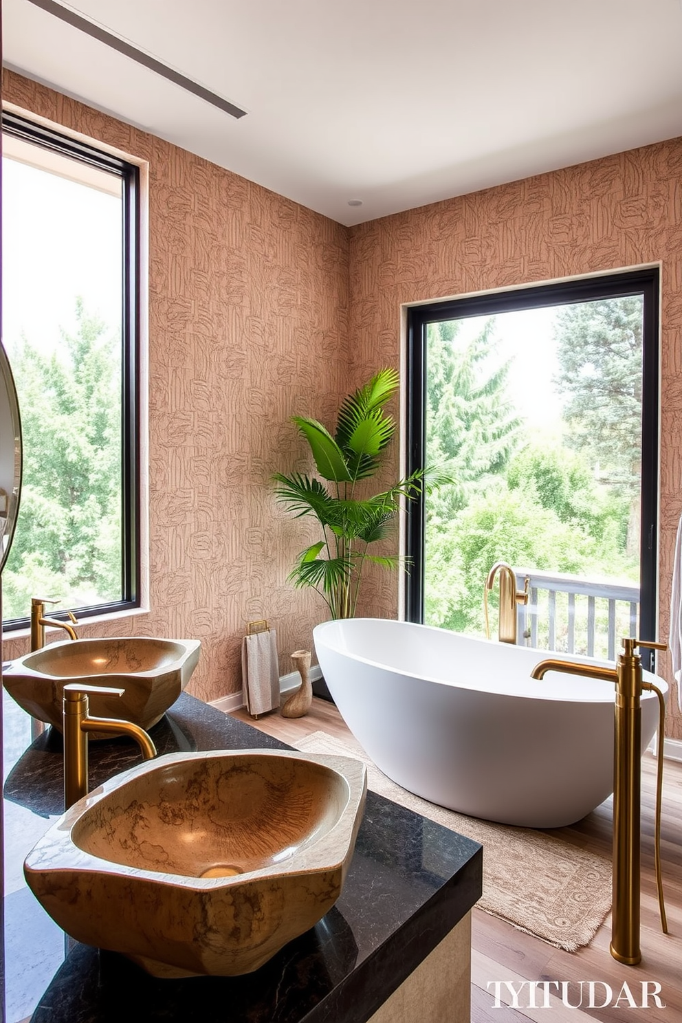 A master bathroom featuring unique sink designs that inspire creativity. The sinks are sculptural, made of natural stone with organic shapes, set against a backdrop of textured wallpaper in soft earth tones. The space includes a freestanding soaking tub with a view, surrounded by large windows letting in natural light. Elegant fixtures in brushed gold add a touch of luxury, while lush greenery brings life to the serene atmosphere.