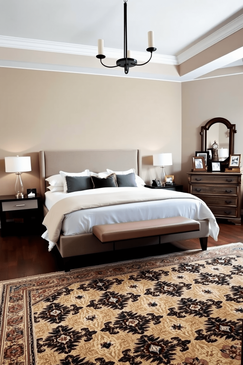 A serene master bedroom featuring a blend of modern and vintage decor elements. The focal point is a plush king-sized bed with an upholstered headboard, flanked by sleek nightstands with contemporary lamps. On the opposite wall, an antique dresser adds character, topped with framed photographs and a vintage clock. The walls are painted in a soft taupe, and a cozy area rug with intricate patterns lies beneath the bed, enhancing the room's warmth.