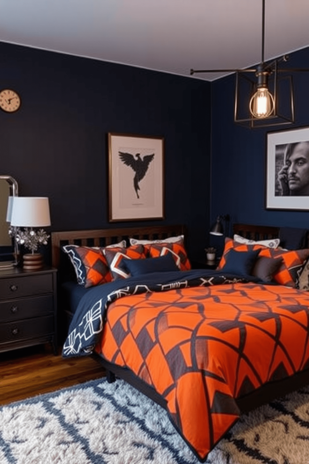 A stylish men's bedroom featuring bold geometric patterns on the bedding. The room is accented with dark wood furniture and industrial-style lighting fixtures. The walls are painted in a deep navy blue, creating a cozy atmosphere. A plush area rug with a contrasting pattern adds warmth and texture to the space.