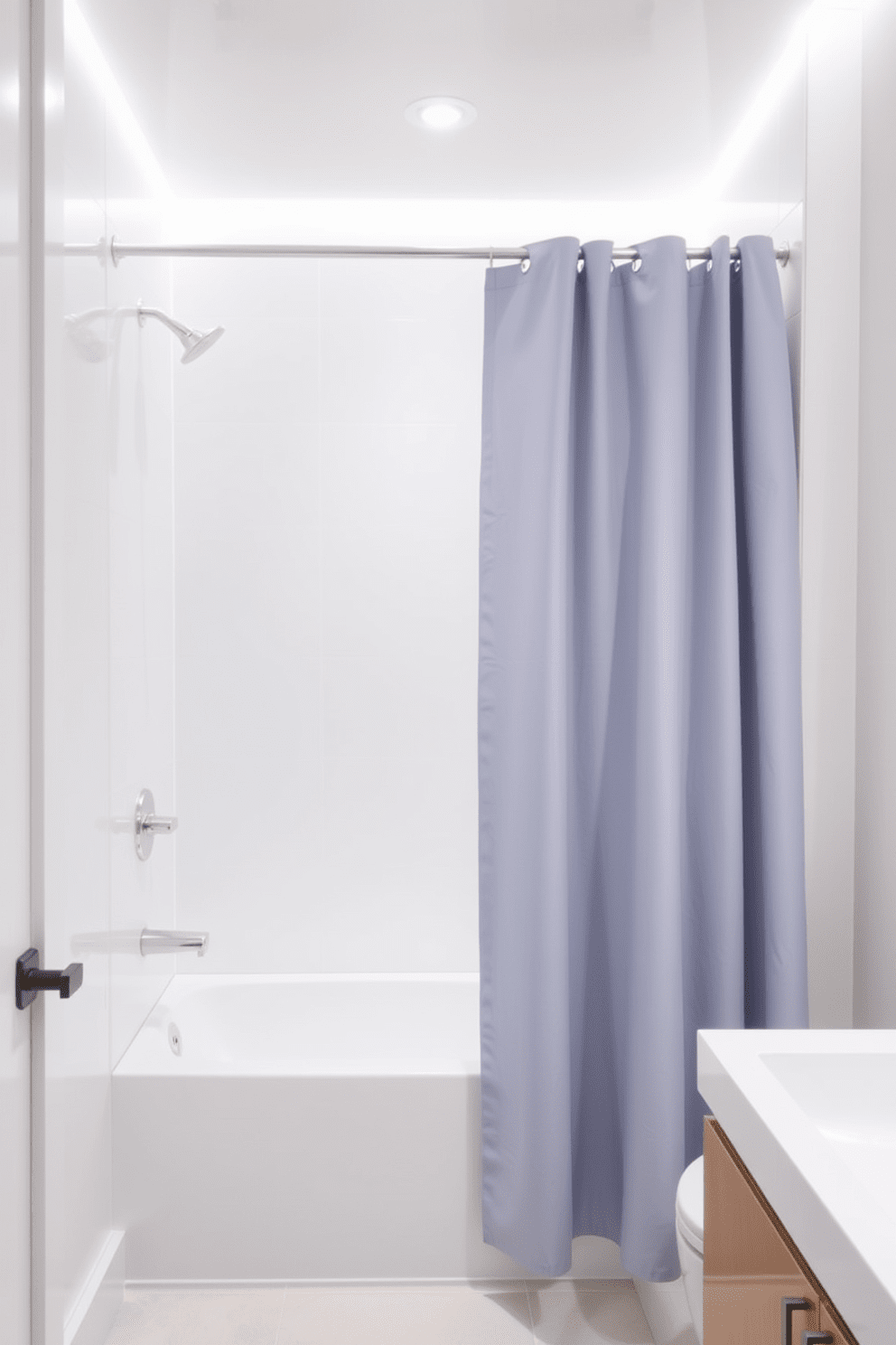 A minimalist bathroom design featuring a simple shower curtain in a solid color. The space is adorned with sleek fixtures and a clean, uncluttered layout that emphasizes functionality and tranquility.