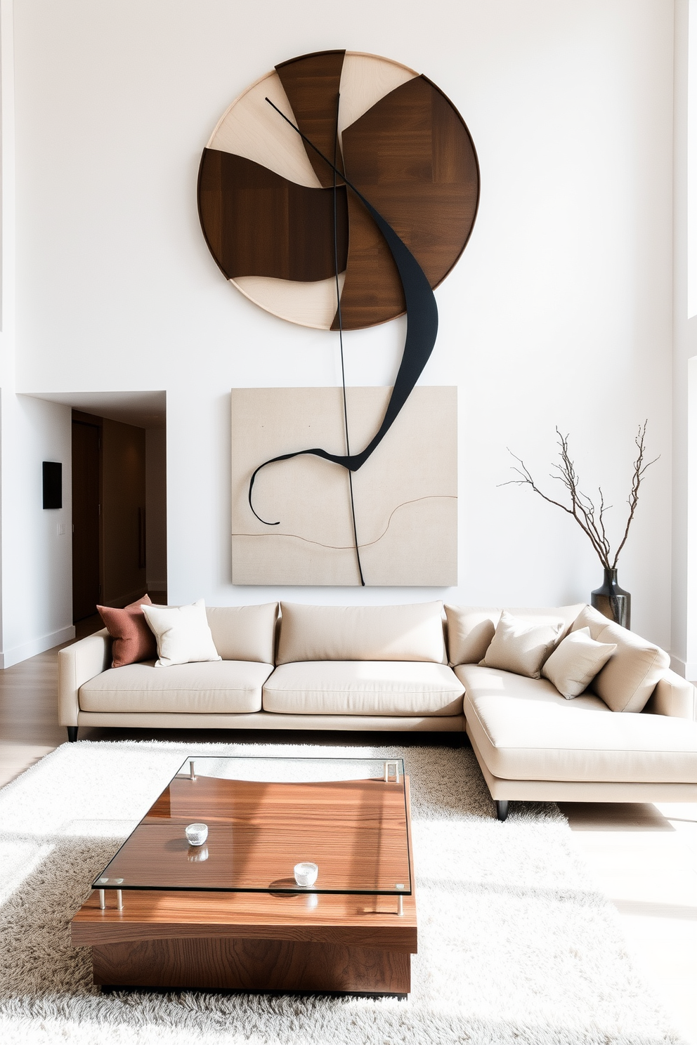 A minimalist family room featuring a sleek sectional sofa in a neutral color. The space is anchored by a large abstract sculpture that serves as a statement piece, drawing attention and adding character. The walls are painted in a soft white, creating an airy and open feel. A low-profile coffee table made of glass and wood complements the design, while a plush area rug adds warmth underfoot.