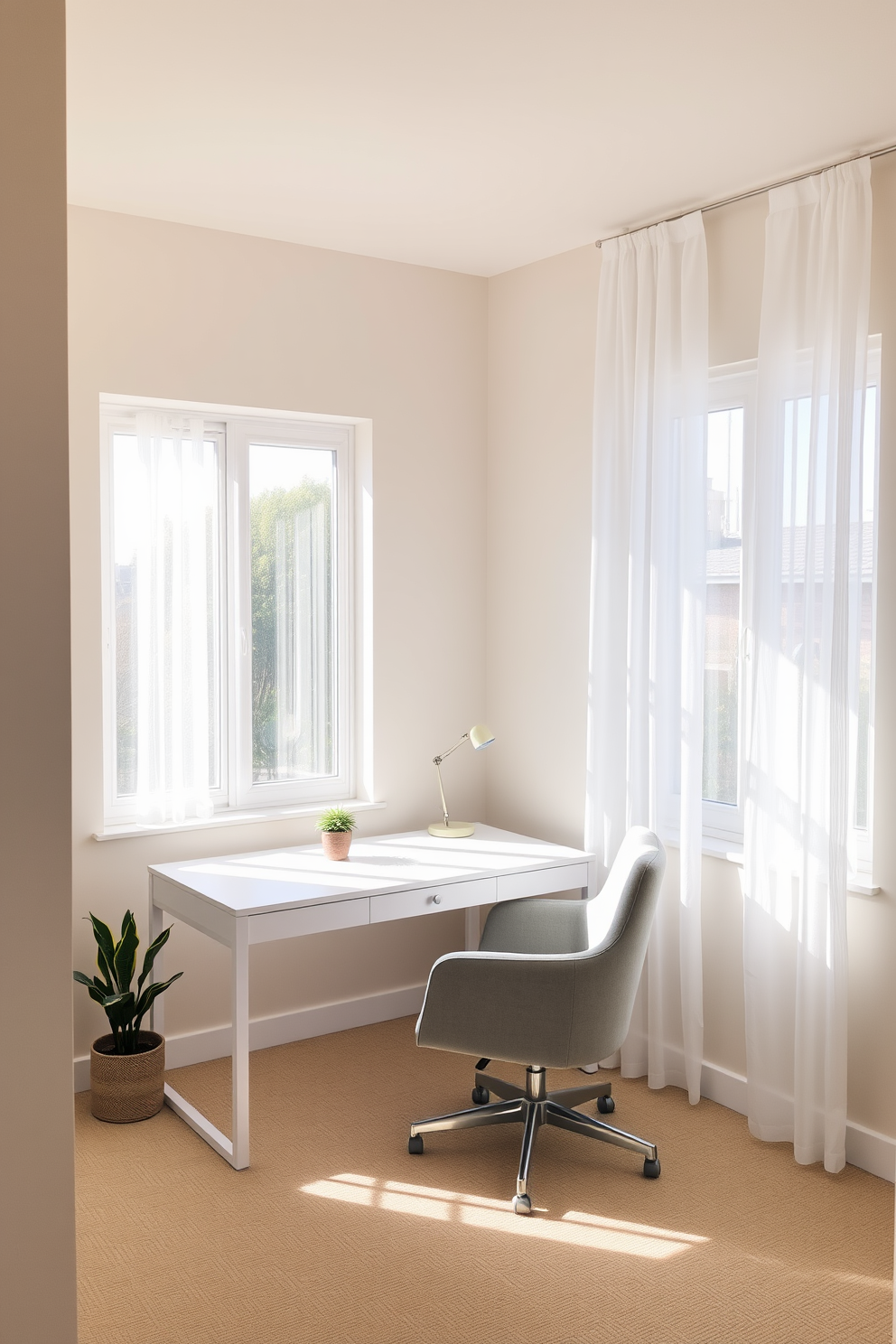 A serene home office space featuring a neutral color palette with soft accents. The walls are painted in a light beige tone, complemented by a sleek white desk and a comfortable chair upholstered in soft gray fabric. Natural light floods the room through a large window adorned with sheer white curtains. A few carefully chosen decorative items, such as a small potted plant and a minimalist desk lamp, enhance the tranquil atmosphere.