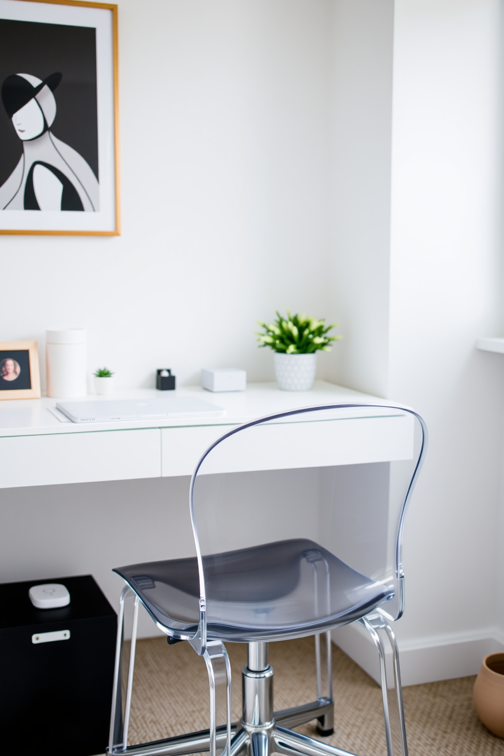 A minimalist home office features a sleek clear acrylic chair that adds a modern touch to the space. The desk is a simple white surface with clean lines, complemented by a few carefully selected decorative items and a potted plant for a pop of greenery.