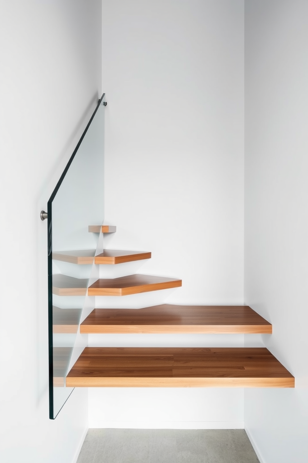 A compact staircase design for small spaces features sleek wooden steps that float elegantly against a white wall. The handrail is made of clear glass, creating an illusion of openness while maximizing light flow. Minimalist staircase design ideas incorporate simple lines and a monochromatic color palette. The use of metal and wood harmonizes to create a striking yet unobtrusive focal point in the room.