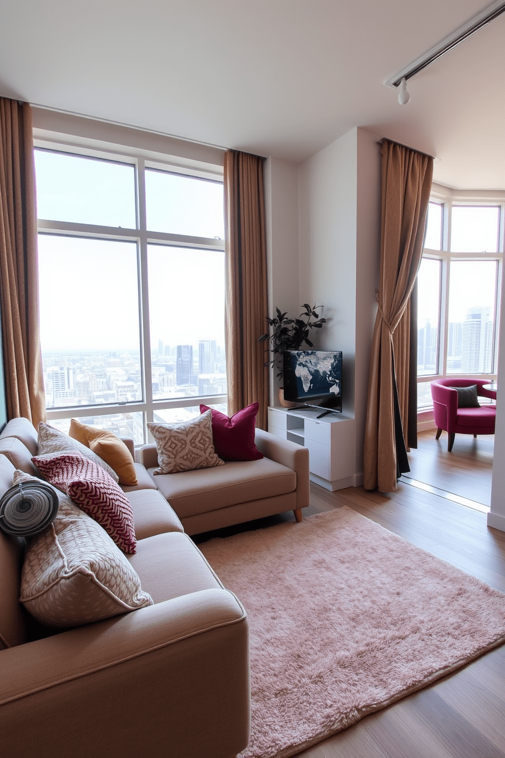 A modern apartment featuring a cozy living area with textured fabrics that create a warm and inviting atmosphere. The space includes a plush sofa adorned with a mix of colorful throw pillows and a soft area rug that complements the overall design. The walls are painted in a soft neutral tone, enhancing the natural light that floods the room. Large windows reveal a stunning city view, while stylish curtains in rich fabrics frame the scene perfectly.