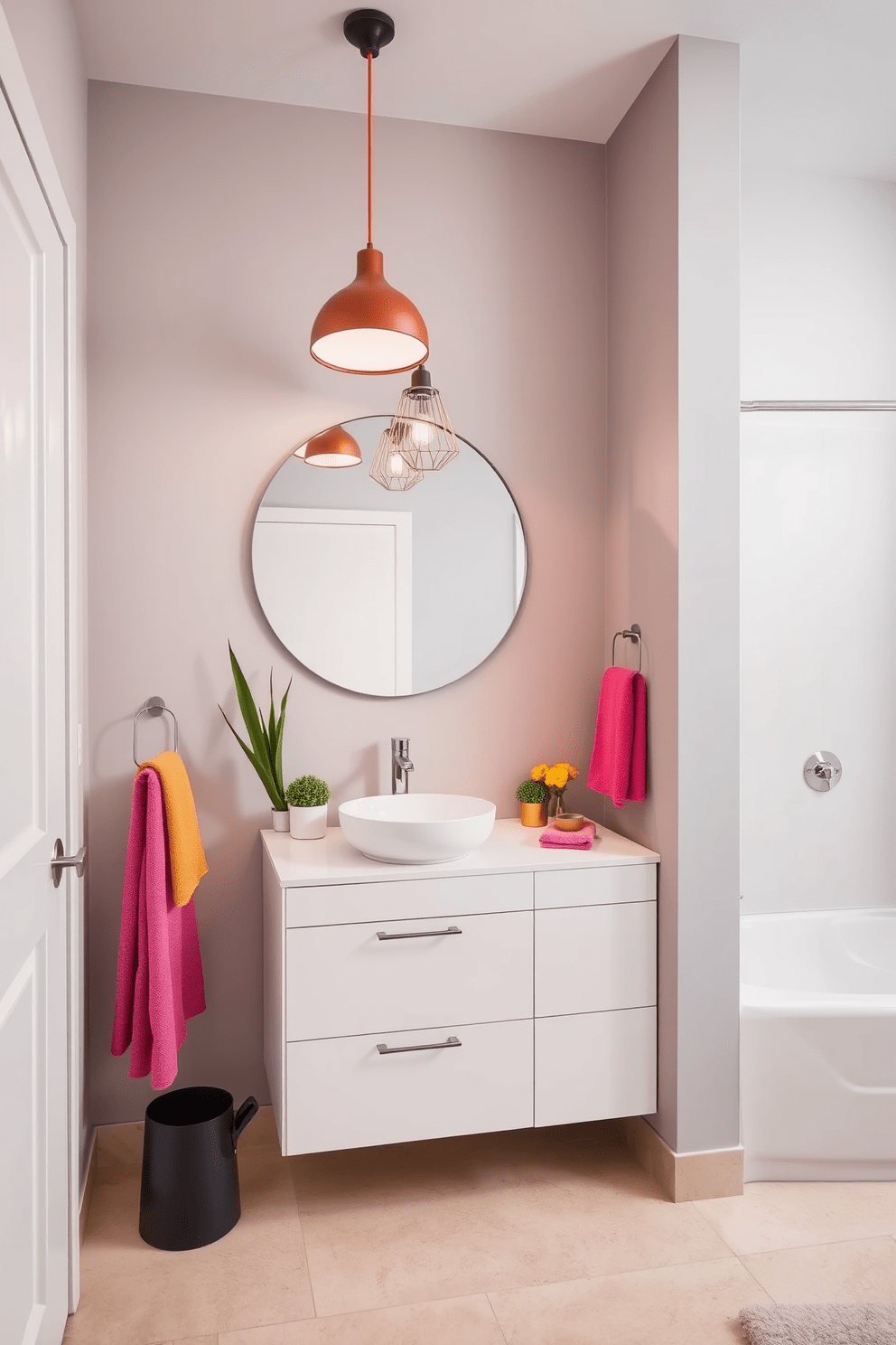 A modern bathroom design featuring a neutral color palette with soft gray walls and a light beige floor. The space is accented with colorful accessories such as vibrant towels, a bright shower curtain, and decorative plants placed on the countertop. The vanity is sleek and minimalistic with a white countertop and a single basin sink. Above the sink, a large round mirror adds depth, while stylish pendant lights in bold colors provide a striking contrast to the overall design.