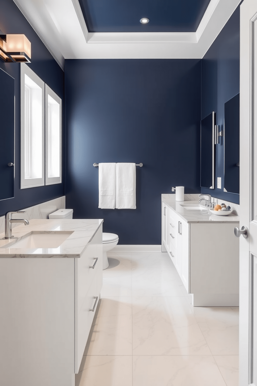 A modern bathroom design featuring bold accent walls in deep colors creates a striking focal point. The space includes sleek fixtures and minimalist decor that enhance the overall sophistication. The deep navy blue accent wall contrasts beautifully with the crisp white cabinetry and marble countertops. Large format tiles in a light shade cover the floor, adding a sense of spaciousness to the design.