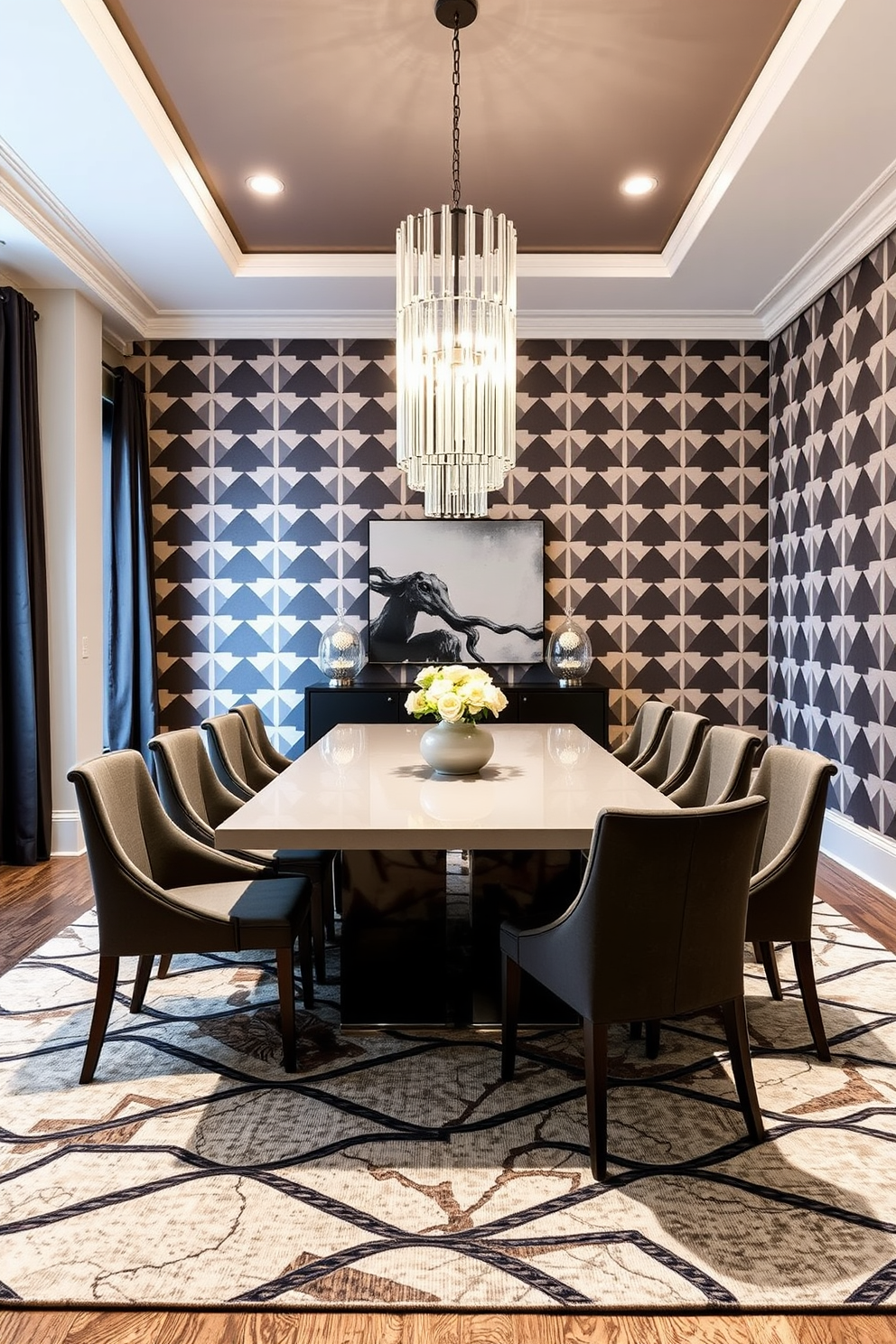 A modern dining room featuring geometric patterns on the walls and a large area rug. The dining table is rectangular with sleek lines, surrounded by upholstered chairs in a complementary color. The walls are adorned with bold geometric wallpaper in contrasting shades. A statement chandelier hangs above the table, casting a warm glow over the space.