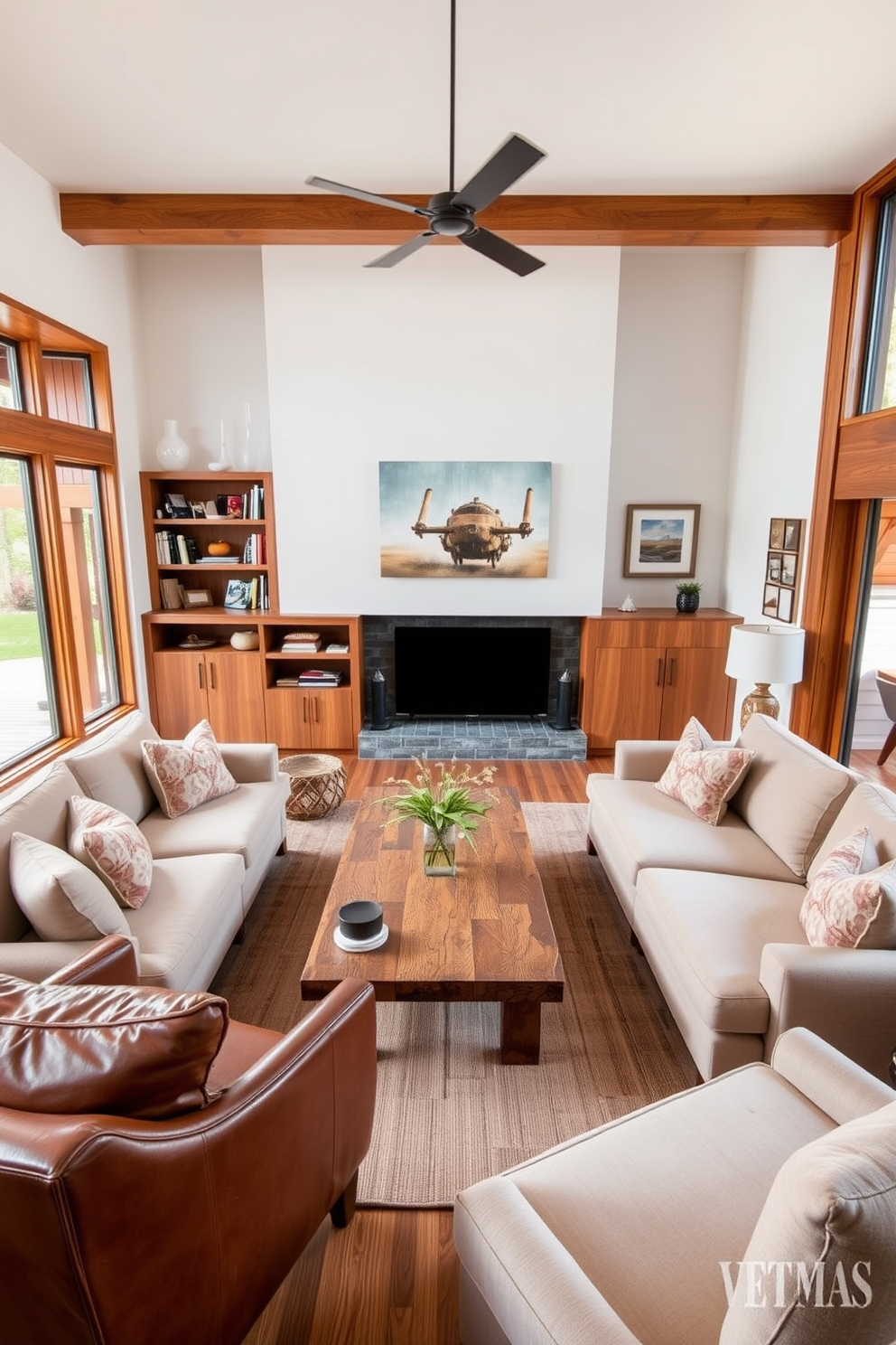 A modern family room with warm wood tones creates an inviting atmosphere. The space features a large sectional sofa in a soft beige fabric, complemented by a rustic wooden coffee table at the center. On one wall, built-in shelves display books and decorative items, while a cozy armchair in a rich brown leather adds seating. Large windows allow natural light to flood in, highlighting the warm wooden accents throughout the room.