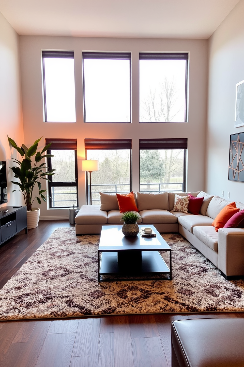 A modern family room featuring a large sectional sofa in a neutral color, complemented by vibrant throw pillows. A sleek coffee table sits in the center, surrounded by a cozy area rug, while large windows allow natural light to flood the space. In one corner, a tall indoor plant adds a touch of freshness, and a stylish floor lamp provides warm illumination. The walls are adorned with contemporary art pieces, and a media console holds the latest technology, creating a perfect blend of comfort and style.