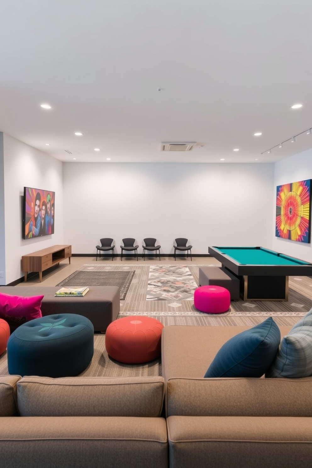 Flexible seating arrangements for gatherings. The space features a combination of modular sofas and poufs that can be easily rearranged to accommodate various group sizes. Modern game room design ideas. The room includes a sleek pool table, a large sectional sofa facing a wall-mounted television, and vibrant artwork that adds a pop of color to the neutral walls.