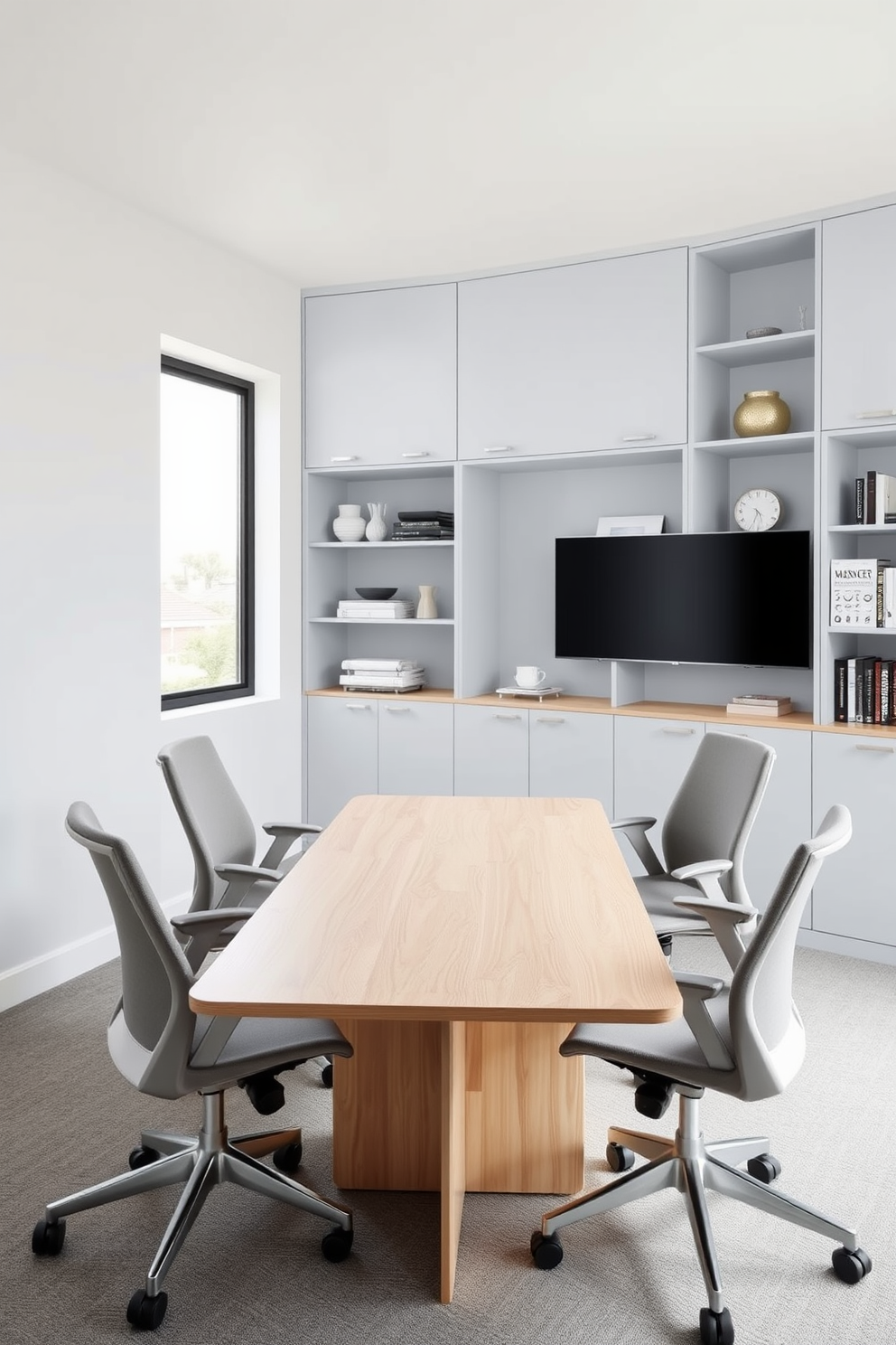 A modern home office designed for small spaces features a sleek, compact conference table made of light wood. Surrounding the table are four ergonomic chairs upholstered in a soft gray fabric, creating a comfortable yet professional atmosphere. The walls are painted in a calming pale blue, enhancing the sense of openness. A large window allows natural light to flood the room, complemented by minimalist shelving adorned with books and decorative items.