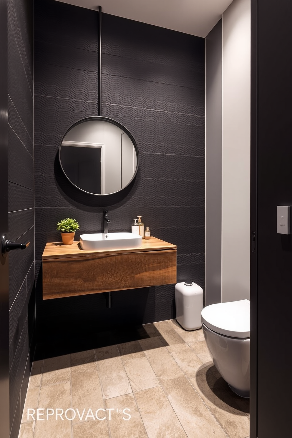 A modern powder room featuring sleek concrete flooring that enhances the urban aesthetic. The walls are adorned with textured tiles in a deep charcoal color, creating a striking contrast with the minimalist white fixtures. A floating vanity made of reclaimed wood adds warmth to the space, complemented by a round mirror with an industrial metal frame. Soft, ambient lighting illuminates the room, highlighting the contemporary decor elements and a small potted plant on the countertop.