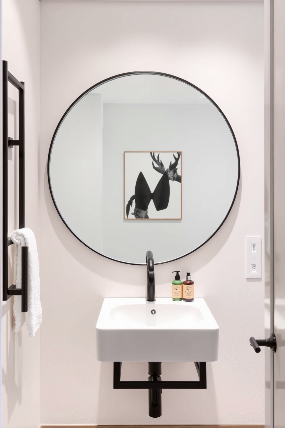 A modern powder room features an oversized round mirror that serves as the focal point, reflecting the stylish decor around it. The walls are adorned with a soft pastel hue, complemented by sleek black fixtures and a minimalist floating vanity.