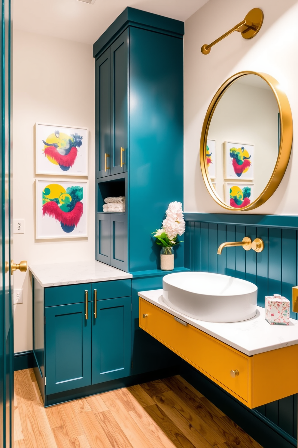 A modern powder room design featuring cabinetry in vibrant accent colors like teal and mustard yellow. The space includes a sleek floating vanity with a white sink and brushed gold fixtures, complemented by colorful artwork on the walls. The flooring is a light wood finish that contrasts beautifully with the bold cabinetry. A round mirror with a gold frame hangs above the vanity, enhancing the room's contemporary feel.