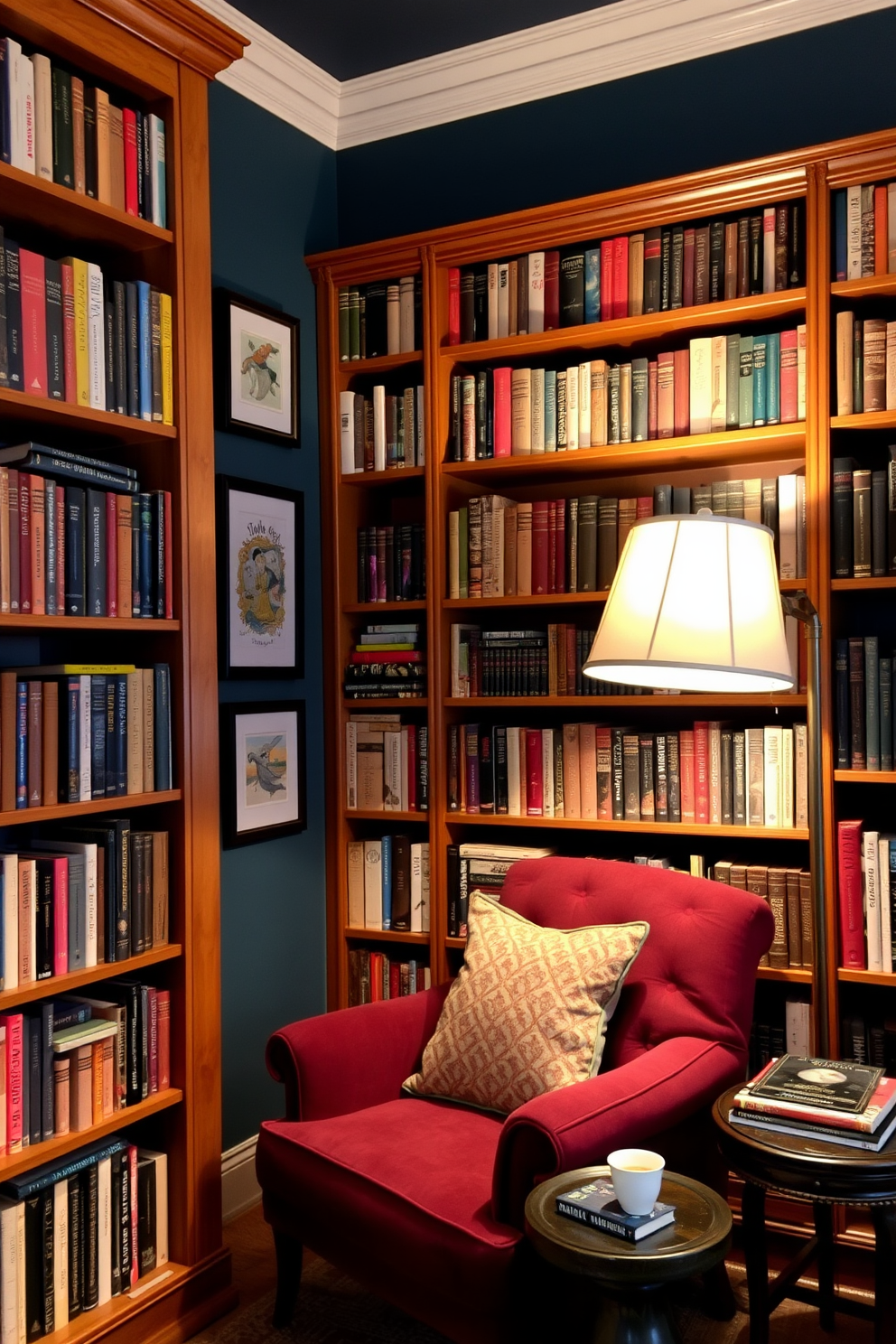 A cozy home library filled with rich wooden bookshelves that reach the ceiling, showcasing an array of colorful books and personalized artwork. A plush armchair in a deep burgundy hue sits in the corner, accompanied by a small side table holding a steaming cup of tea. Soft, ambient lighting creates a warm atmosphere, with a vintage floor lamp casting a gentle glow over the reading nook. The walls are painted in a deep navy blue, adorned with framed pieces of artwork that inspire creativity and reflection.