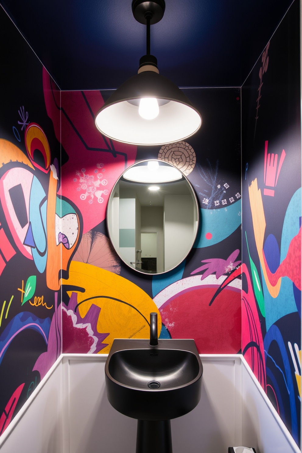 An artistic mural covers the entire wall of the powder room, featuring vibrant colors and abstract patterns that create a striking focal point. The ceiling is painted a deep navy blue, enhancing the moody atmosphere and making the mural stand out even more. The fixtures are sleek and modern, with a matte black sink and faucet that contrast beautifully against the mural. Soft, ambient lighting is provided by a stylish pendant light, casting a warm glow throughout the space.