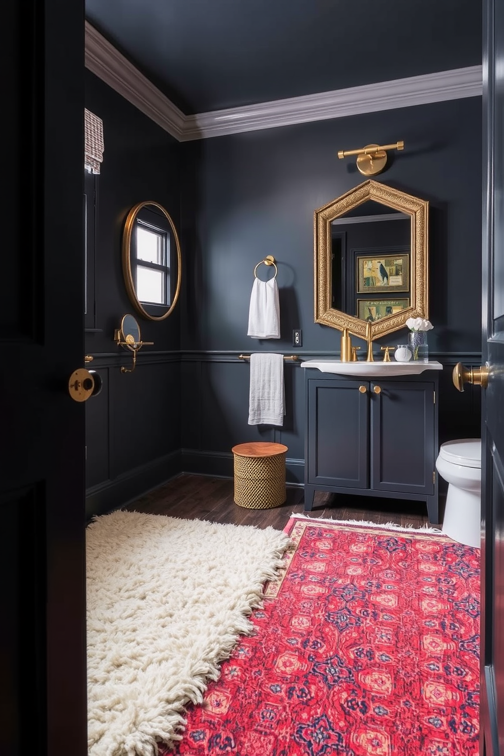 A cozy atmosphere is created with layered rugs in rich textures and colors. The combination of a soft wool rug underneath a vibrant patterned rug adds depth and warmth to the space. The moody powder room features dark walls painted in deep navy or charcoal. Accents of brass fixtures and a statement mirror enhance the intimate and sophisticated vibe of the room.