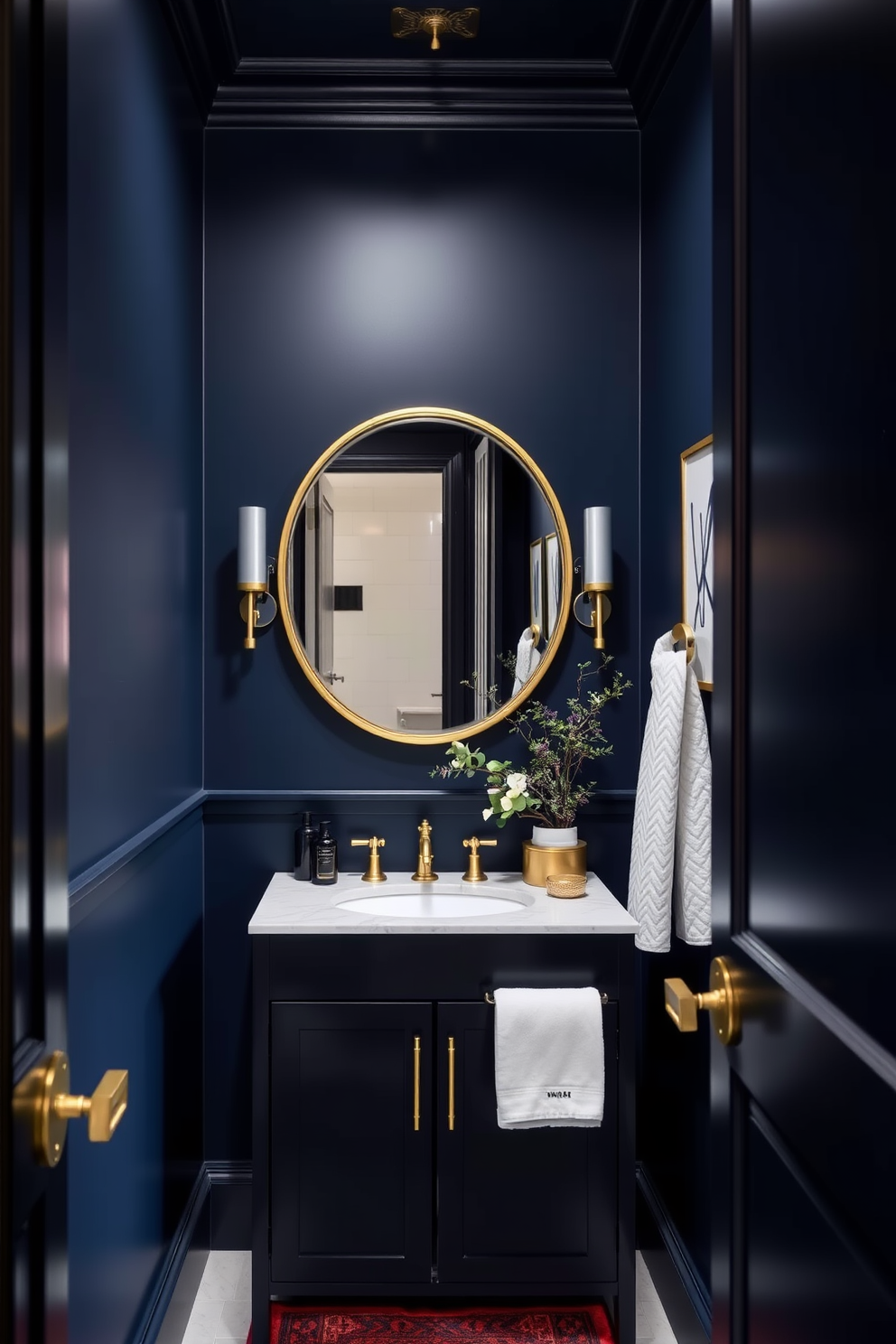 Rich navy blue walls create a striking backdrop for this moody powder room. Gold accents are incorporated through the fixtures and decorative elements, enhancing the luxurious feel of the space. A sleek black vanity with a white marble countertop adds contrast and elegance. A large round mirror with a gold frame reflects the ambient lighting, creating a warm and inviting atmosphere.