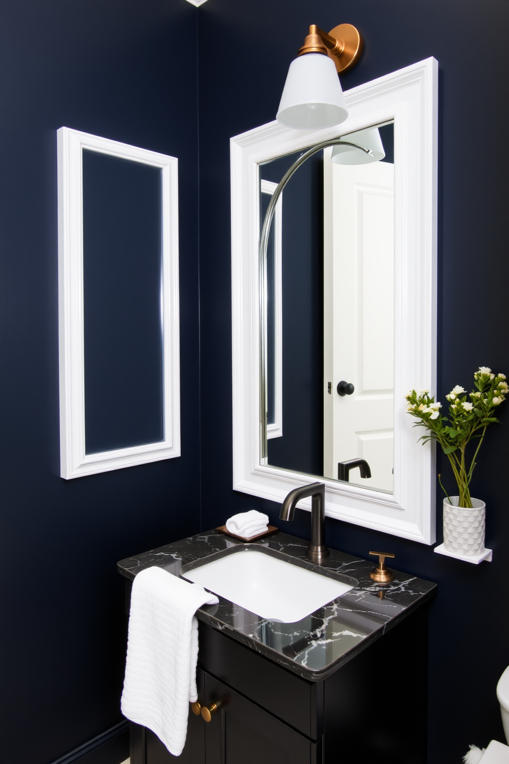 A moody powder room featuring a statement faucet in a bold finish. The walls are painted in a deep navy blue, complemented by a sleek dark vanity with a striking marble countertop.