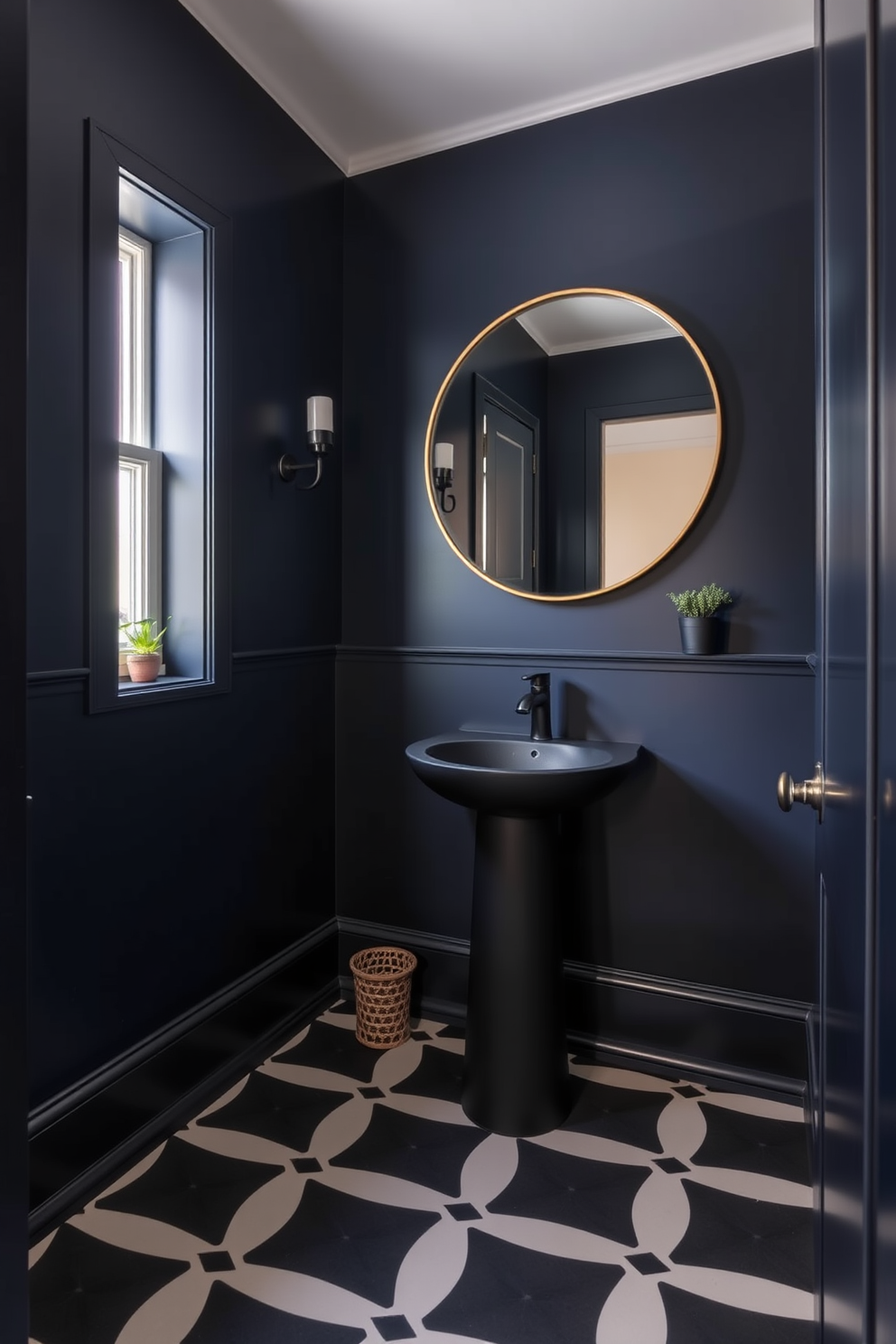 A moody powder room with bold geometric patterns on the floor. The walls are painted in a deep navy blue, and a sleek black pedestal sink stands against one side. A large round mirror with a thin gold frame reflects the ambient lighting. Decorative elements include a stylish wall-mounted sconce and a small potted plant on the windowsill.