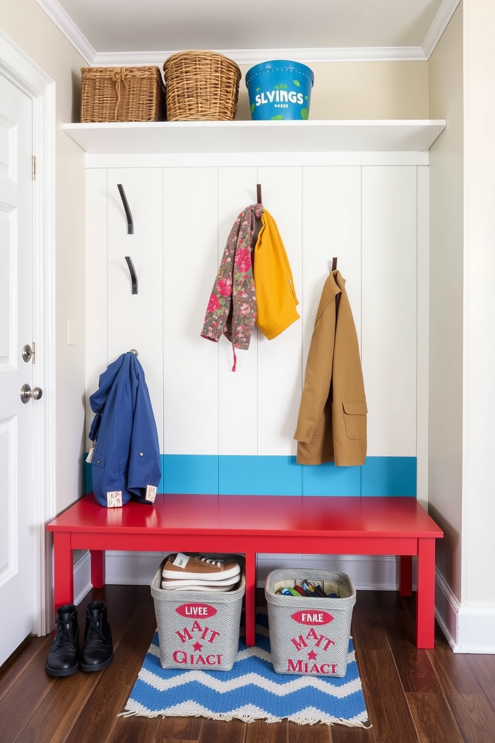 A stylish mudroom features a two-tone painted bench that adds a vibrant pop of color. The bench is flanked by hooks for hanging coats and a small shelf above for storing hats and gloves.